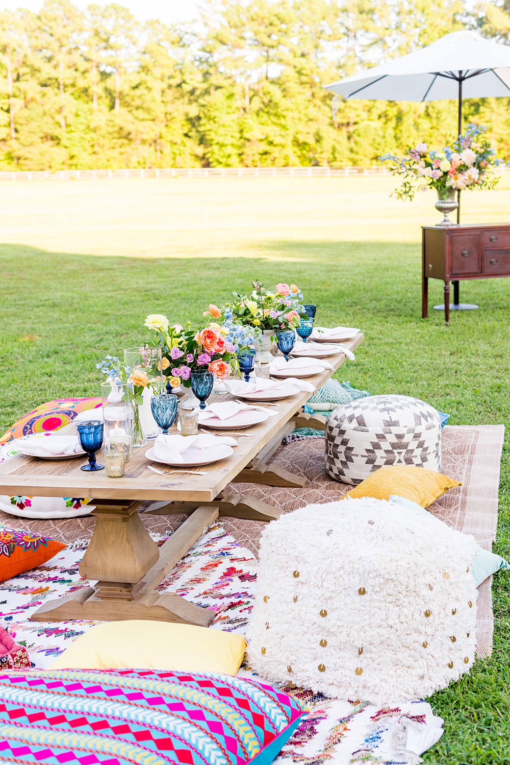 Step inside this colorful outdoor bohemian thirtieth birthday party. Full of color, and the yummiest vegan unicorn confetti cakes you ever did find! Click through for the details. Mikkel Paige Photography #gardenparty #birthdayparty #bohemianparty #unicornparty #styledshoot #backyardparty #flowers | glitterinc.com | @glitterinc