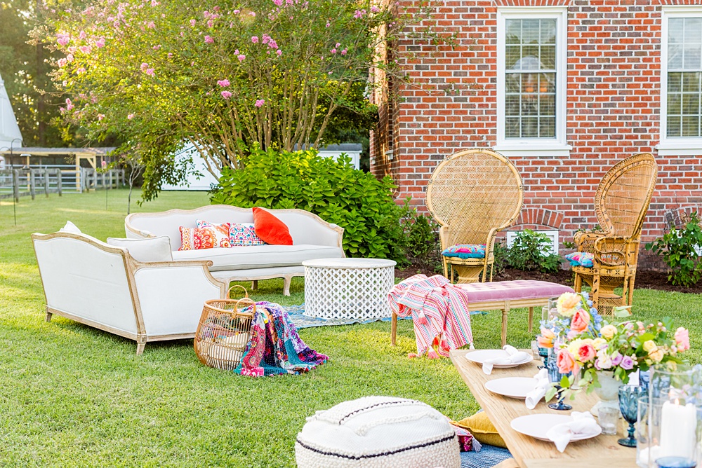 Step inside this colorful outdoor bohemian thirtieth birthday party. Full of color, lush garden flowers, and the yummiest vegan unicorn confetti cakes you ever did find! Click through for the details. Mikkel Paige Photography #gardenparty #birthdayparty #bohemianparty #unicornparty #styledshoot #backyardparty #flowers | glitterinc.com | @glitterinc