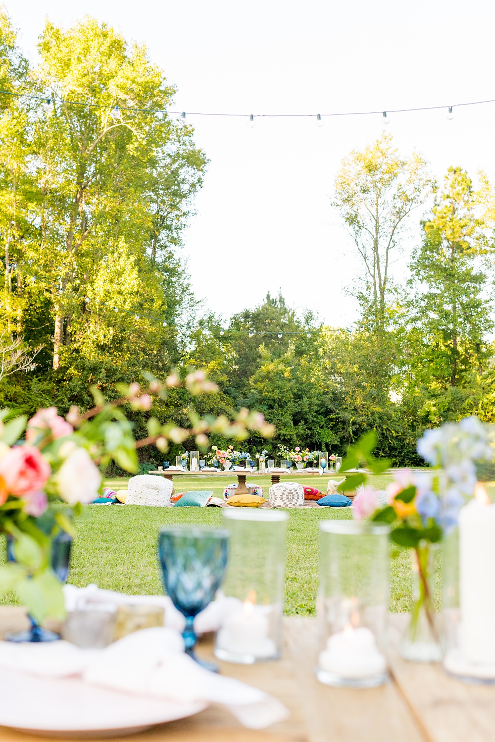 Step inside this colorful outdoor bohemian thirtieth birthday party. Full of color, lush garden flowers, and the yummiest vegan unicorn confetti cakes you ever did find! Click through for the details. Mikkel Paige Photography #gardenparty #birthdayparty #bohemianparty #unicornparty #backyardparty #flowers | glitterinc.com | @glitterinc