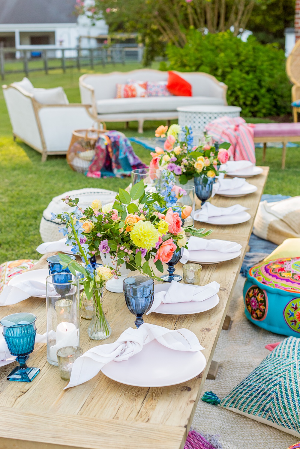 Step inside this colorful outdoor bohemian thirtieth birthday party. Full of color, lush garden flowers, and the yummiest vegan unicorn confetti cakes you ever did find! Click through for the details. Mikkel Paige Photography #gardenparty #birthdayparty #bohemianparty #unicornparty #styledshoot #backyardparty #flowers | glitterinc.com | @glitterinc