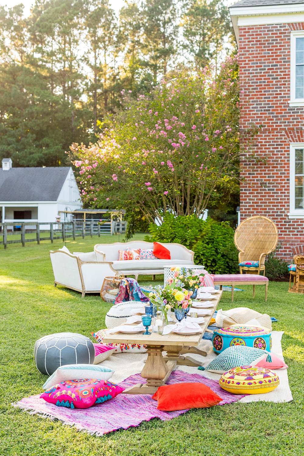 Step inside this colorful outdoor bohemian thirtieth birthday party. Full of color, lush garden flowers, and the yummiest vegan unicorn confetti cakes you ever did find! Click through for the details. Mikkel Paige Photography #gardenparty #birthdayparty #bohemianparty #unicornparty #styledshoot #backyardparty #flowers | glitterinc.com | @glitterinc