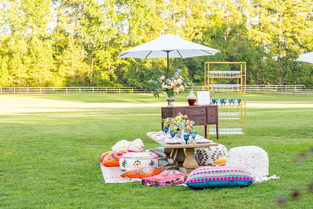 Step inside this colorful outdoor bohemian thirtieth birthday party. Full of color, lush garden flowers, and the yummiest vegan unicorn confetti cakes you ever did find! Click through for the details. Mikkel Paige Photography #gardenparty #birthdayparty #bohemianparty #unicornparty #styledshoot #backyardparty #flowers | glitterinc.com | @glitterinc