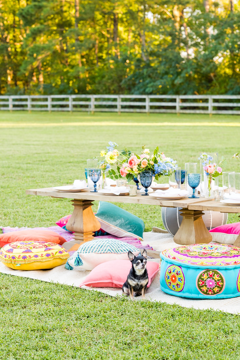 Step inside this colorful outdoor bohemian thirtieth birthday party. Full of color, lush garden flowers, and the yummiest vegan unicorn confetti cakes you ever did find! Click through for the details. Mikkel Paige Photography #gardenparty #birthdayparty #bohemianparty #styledshoot #backyardparty #flowers | glitterinc.com | @glitterinc