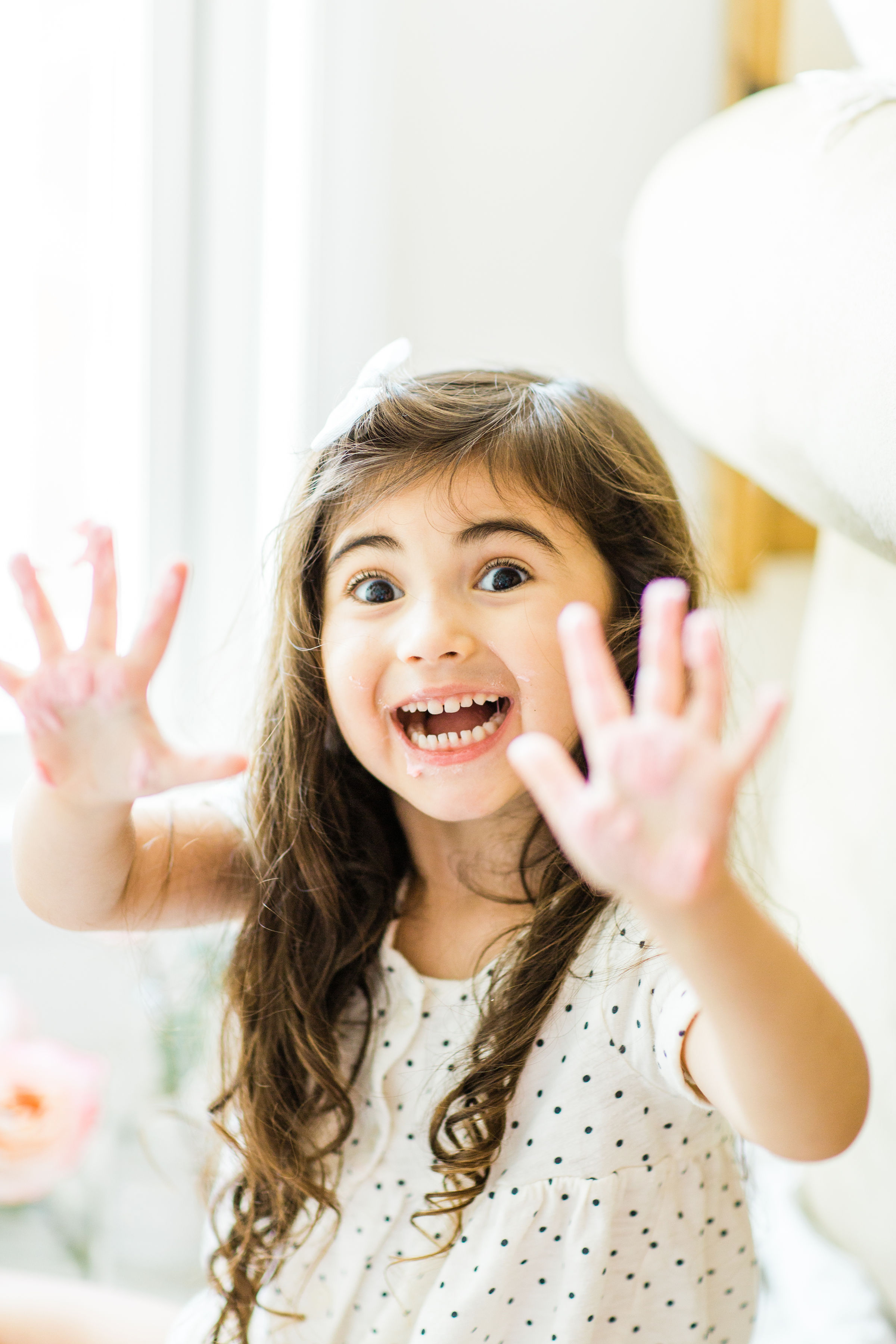 Looking for a little inspiration for baby's first birthday cake smash photo shoot? We're keeping it simple and adorable for Emmeline's cake smash, plus, we're sharing our favorite dairy-free vanilla crazy cake recipe! Click through for the details and #recipe. #firstbirthday #babybirthday #cakesmash #babycakesmash #cakesmashrecipe #firstbirthdaycake | glitterinc.com | @glitterinc