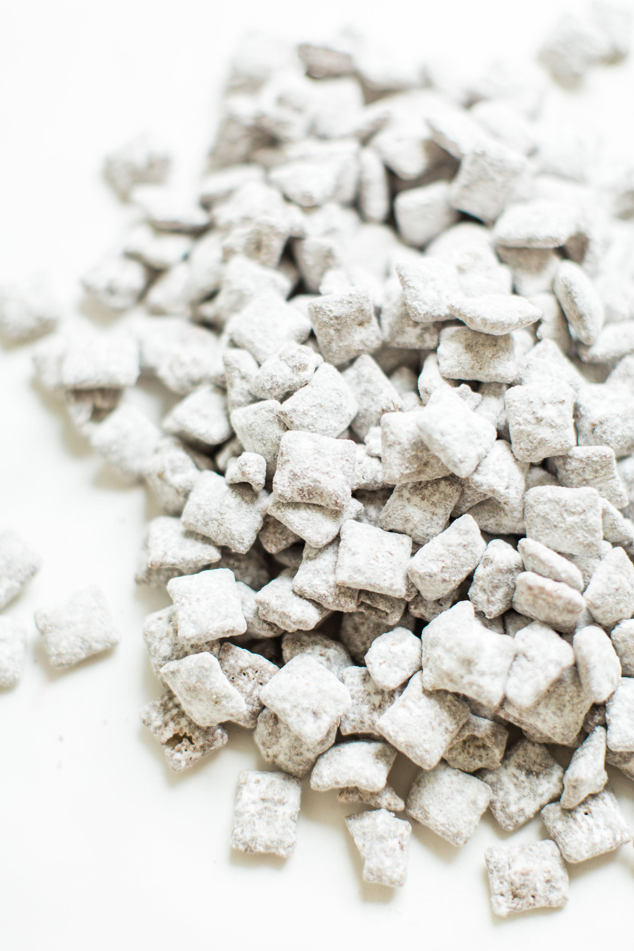 Positively addictive classic Puppy Chow Muddy Buddies - comes together in minutes, is no-bake, and can be made up in big batches - perfect for gifting! Click through for the recipe. #muddybuddies #puppychow #holidayrecipe #dairyfree #vegan #vegandessert | glitterinc.com | @glitterinc