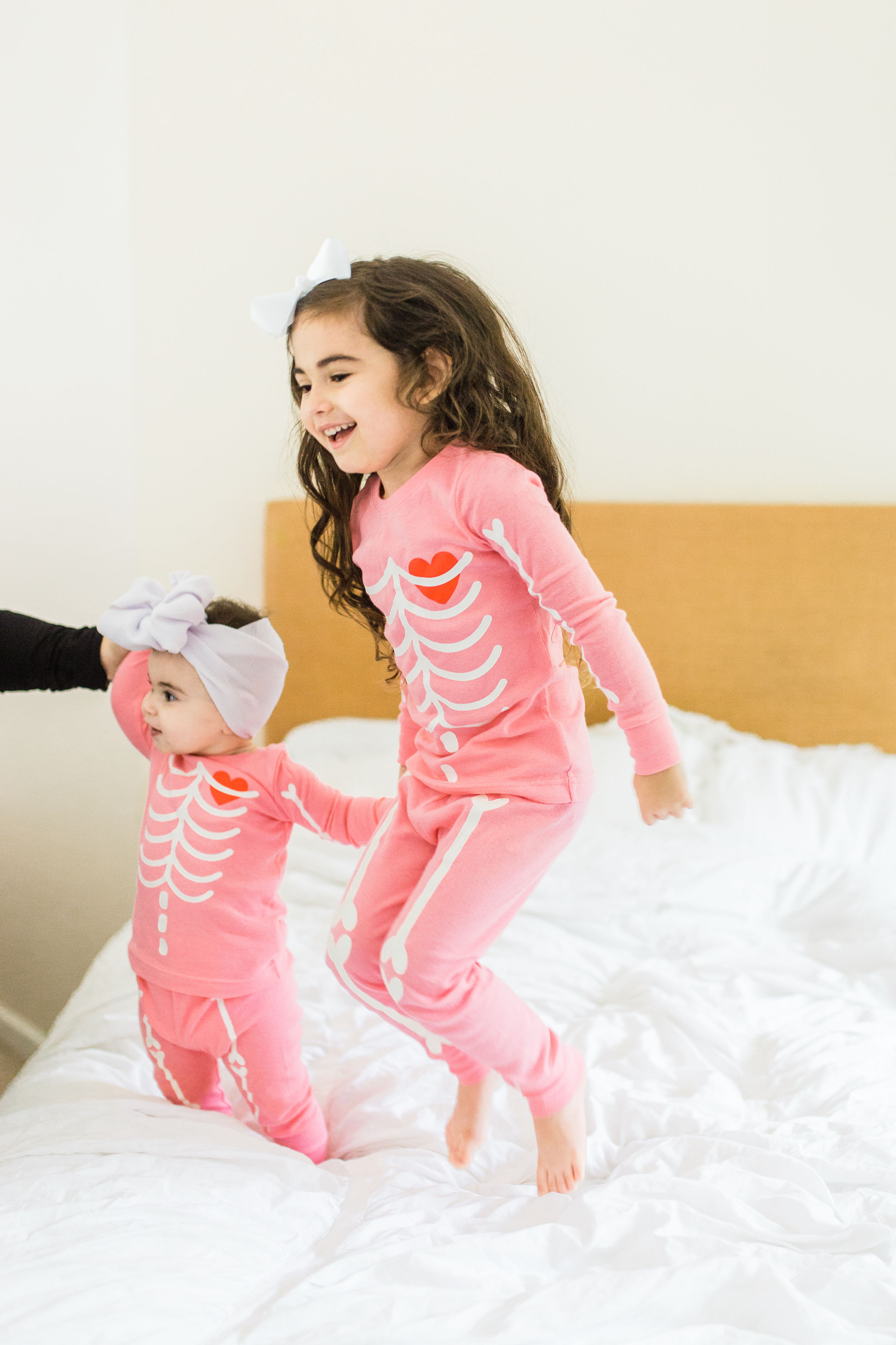 Looking to start a few fun Halloween family traditions? We're sharing our favorites, including a roundup of the best Halloween movies for kids, the cutest matching Halloween pajamas for your little ones, and plenty of spooky party inspiration and recipes! Click through for the details. #halloween #halloweenpajamas #halloweenideas #halloweentraditions #familyhalloween #kidshalloween #kidshalloweenfun #kidshalloweenpajamas #babyhalloween | glitterinc.com | @glitterinc