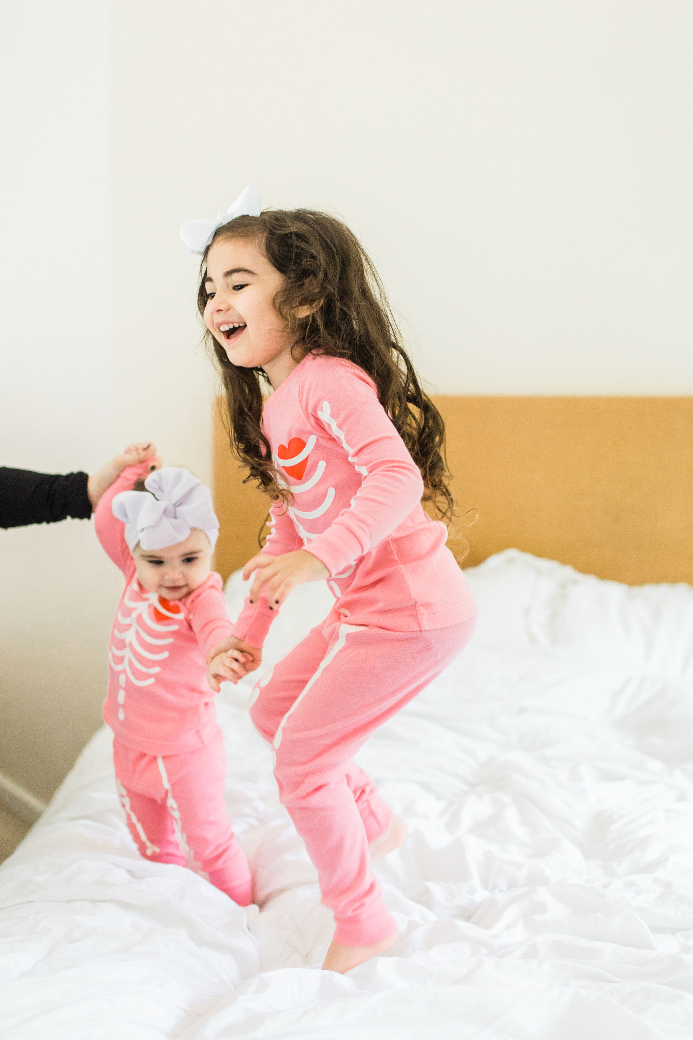 Looking to start a few fun Halloween family traditions? We're sharing our favorites, including a roundup of the best Halloween movies for kids, the cutest matching Halloween pajamas for your little ones, and plenty of spooky party inspiration and recipes! Click through for the details. #halloween #halloweenpajamas #halloweenideas #halloweentraditions #familyhalloween #kidshalloween #kidshalloweenfun #kidshalloweenpajamas #babyhalloween | glitterinc.com | @glitterinc