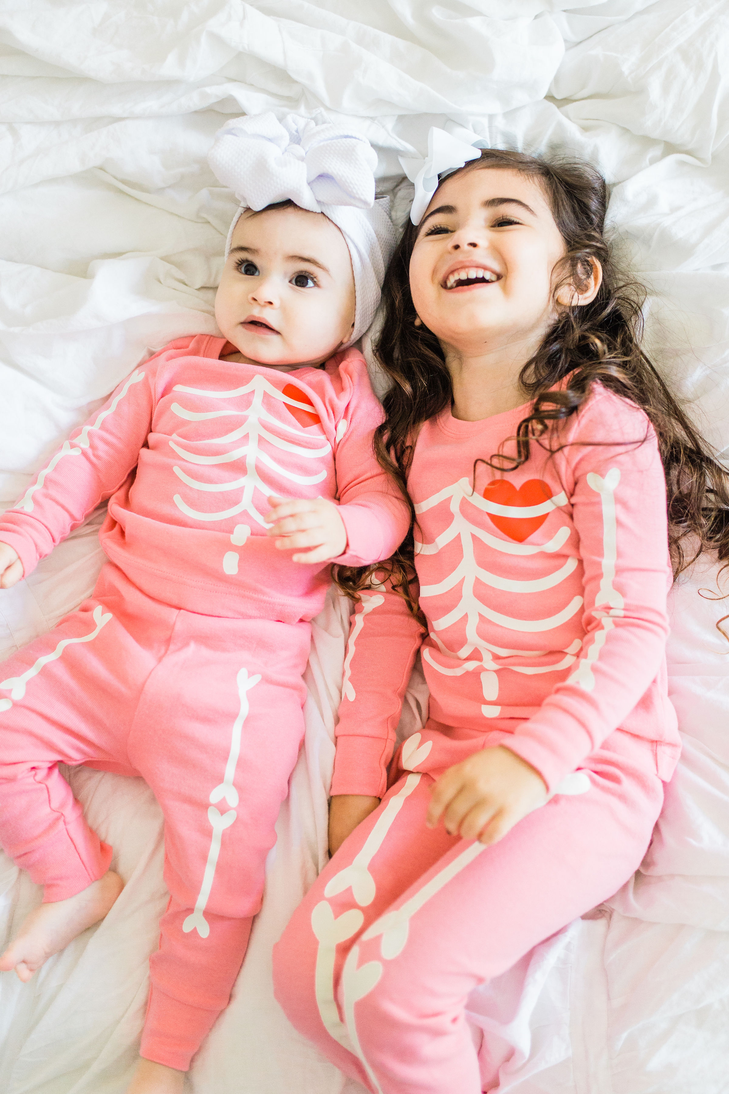 Looking to start a few fun Halloween family traditions? We're sharing our favorites, including a roundup of the best Halloween movies for kids, the cutest matching Halloween pajamas for your little ones, and plenty of spooky party inspiration and recipes! Click through for the details. #halloween #halloweenpajamas #halloweenideas #halloweentraditions #familyhalloween  #kidshalloweenfun #kidshalloweenpajamas #babyhalloween | glitterinc.com | @glitterinc