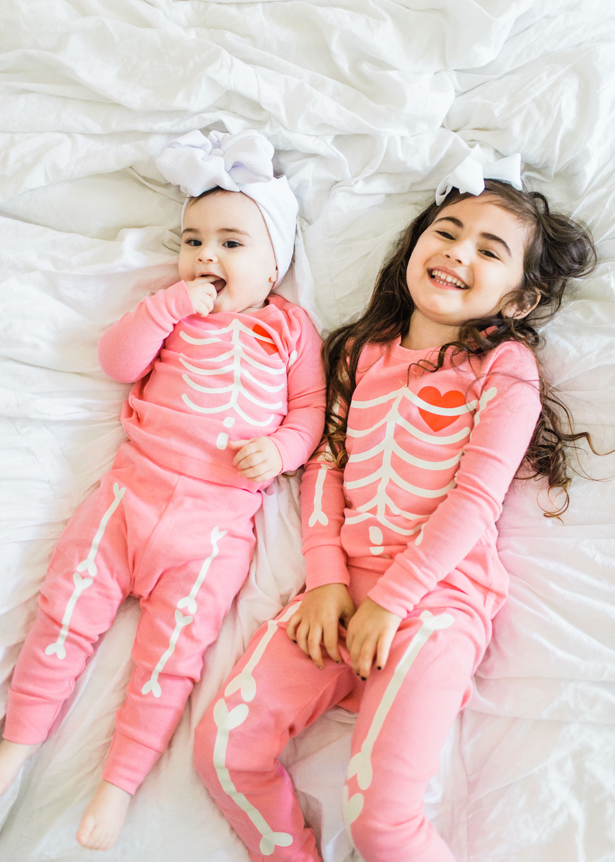 Looking to start a few fun Halloween family traditions? We're sharing our favorites, including a roundup of the best Halloween movies for kids, the cutest matching Halloween pajamas for your little ones, and plenty of spooky party inspiration and recipes! Click through for the details. #halloween #halloweenpajamas #halloweenideas #halloweentraditions  #kidshalloween #kidshalloweenfun #kidshalloweenpajamas #babyhalloween | glitterinc.com | @glitterinc