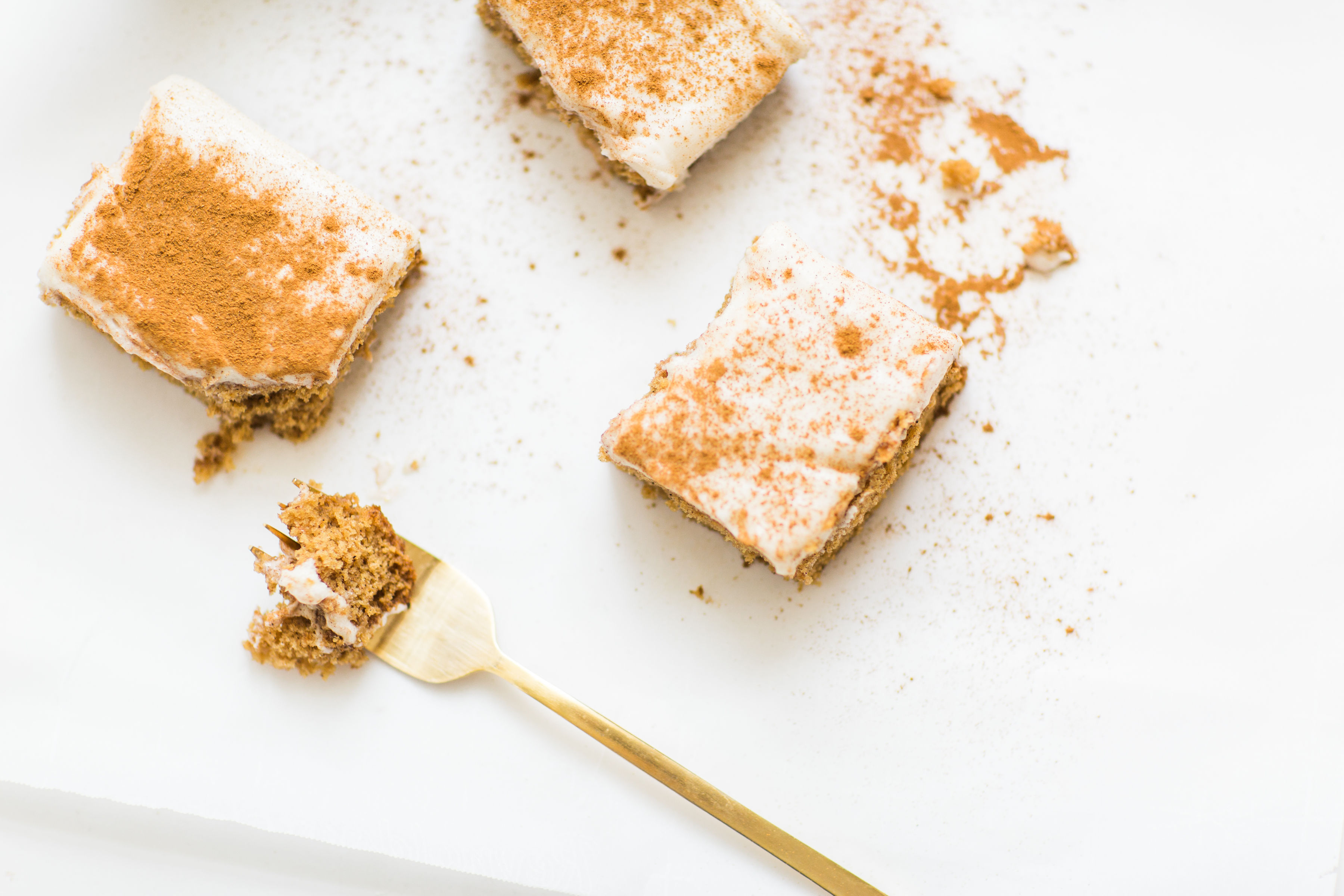 This incredible applesauce snack cake is easy to make; soft, fluffy, moist, and filled with fall spices; topped with rich cream cheese frosting, and kids and grownups alike LOVE it. Click through for the recipe. #snackcake #applesaucecake #applecake #applesaucsnackcake #creamcheesefrosing #dairyfree #healthycake #kidssnack #kidsrecipe | @glitterinc