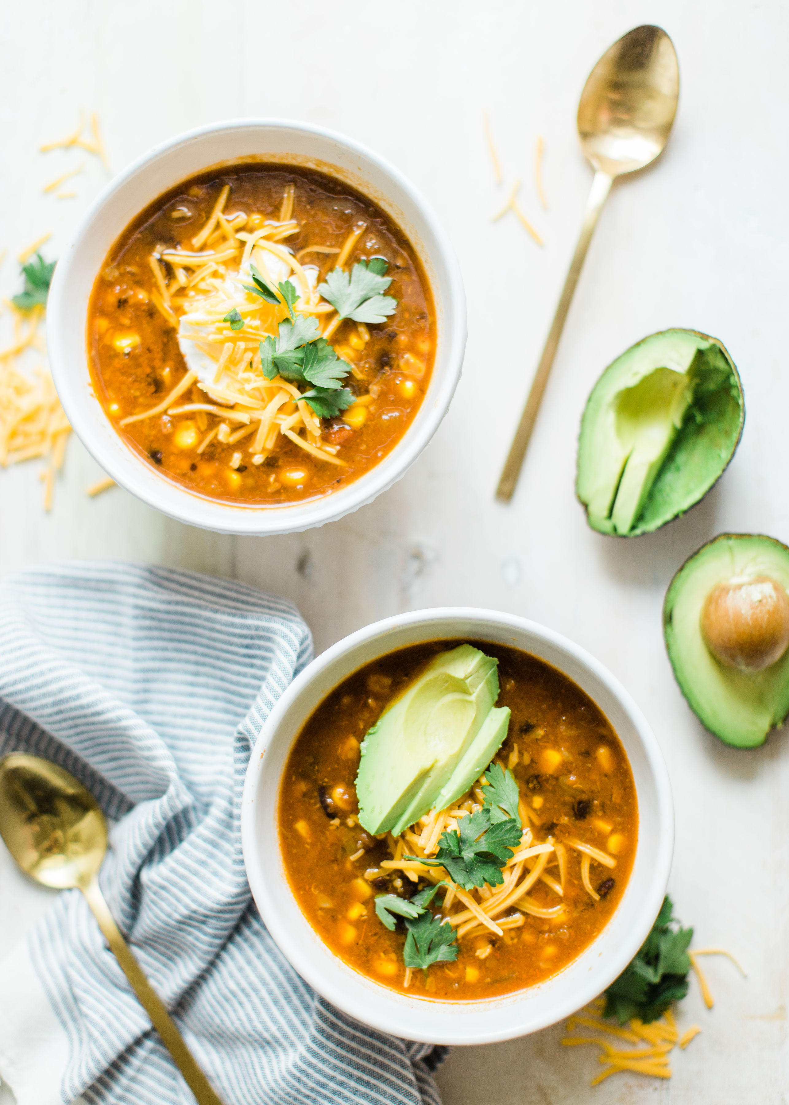 Obsessed with Trader Joe's Harvest Chili? Looking to whip up a delicious family dinner on a budget? Make your own easy copycat crockpot Trader Joe's harvest chili. (Say that three times fast!) This soup is vegetarian and so yummy. Click through for the recipe. #harvestchili #traderjoes #vegetarianchili #soup #vegetariansoup #crockpotchili #crockpotsoup #instantpot #crockpot #instantpotchili | glitterinc.com | @glitterinc