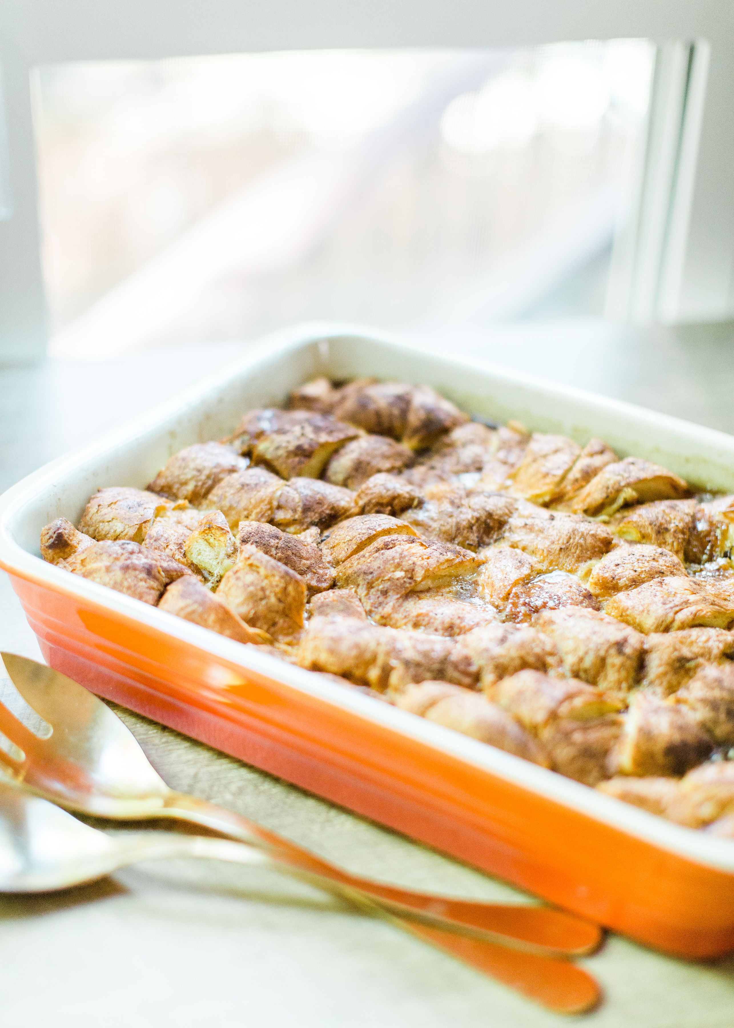 Look no further than this insanely amazing overnight crème brûlée french toast casserole. This decadent dessert has been a staple at our family brunches for years, and with this one special tweak, we've managed to make it even better. Read on for the details! Click through for the recipe. #cremebruleefrenchtoast #cremebruleefrenchtoastcasserole #brunch | glitterinc.com | @glitterinc