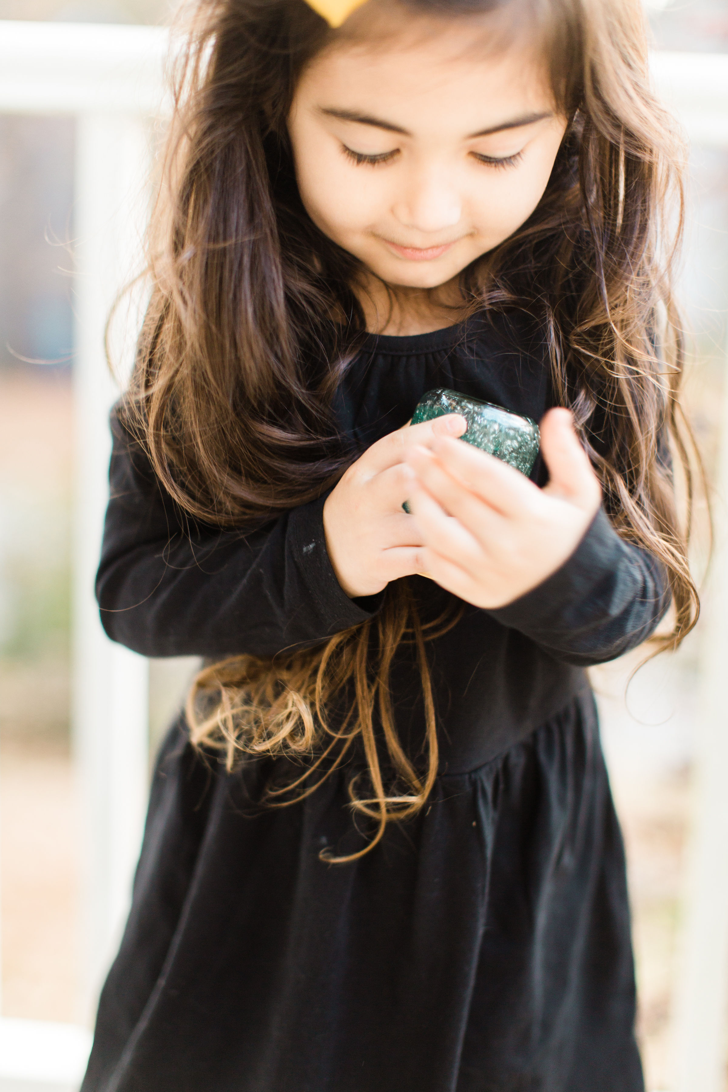 Glitter DIY snow globes are fun to make, are a great craft to do with kids, and double as a calm down sensory bottle for a little quiet time on days when the whole family is going a little stir crazy! Click through for the details. #kidsdiy #kidscraft #diysnowglobes #howtomakesnowglobes #sensorybottles #sensoryglobes #toddlercraft #wintercraft #christmas #christmascraft | glitterinc.com | @glitterinc