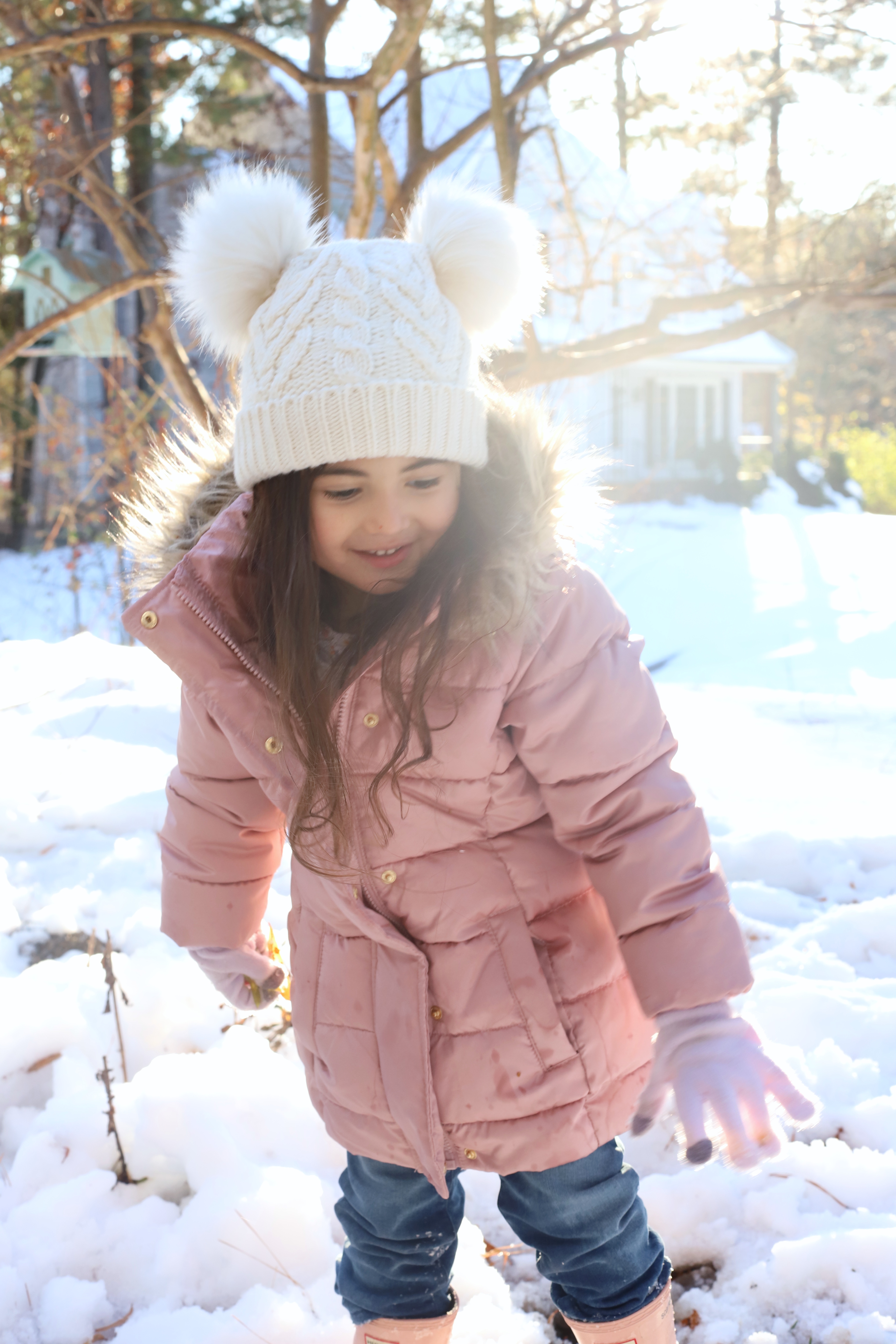 First Snow of the Season + a Fun Way to Paint Snow with Kids. Click through for the DIY. #snowpaint #snowday #snowactivities #snowfun #howtopaintsnow #snowspraypaint | glitterinc.com | @glitterinc