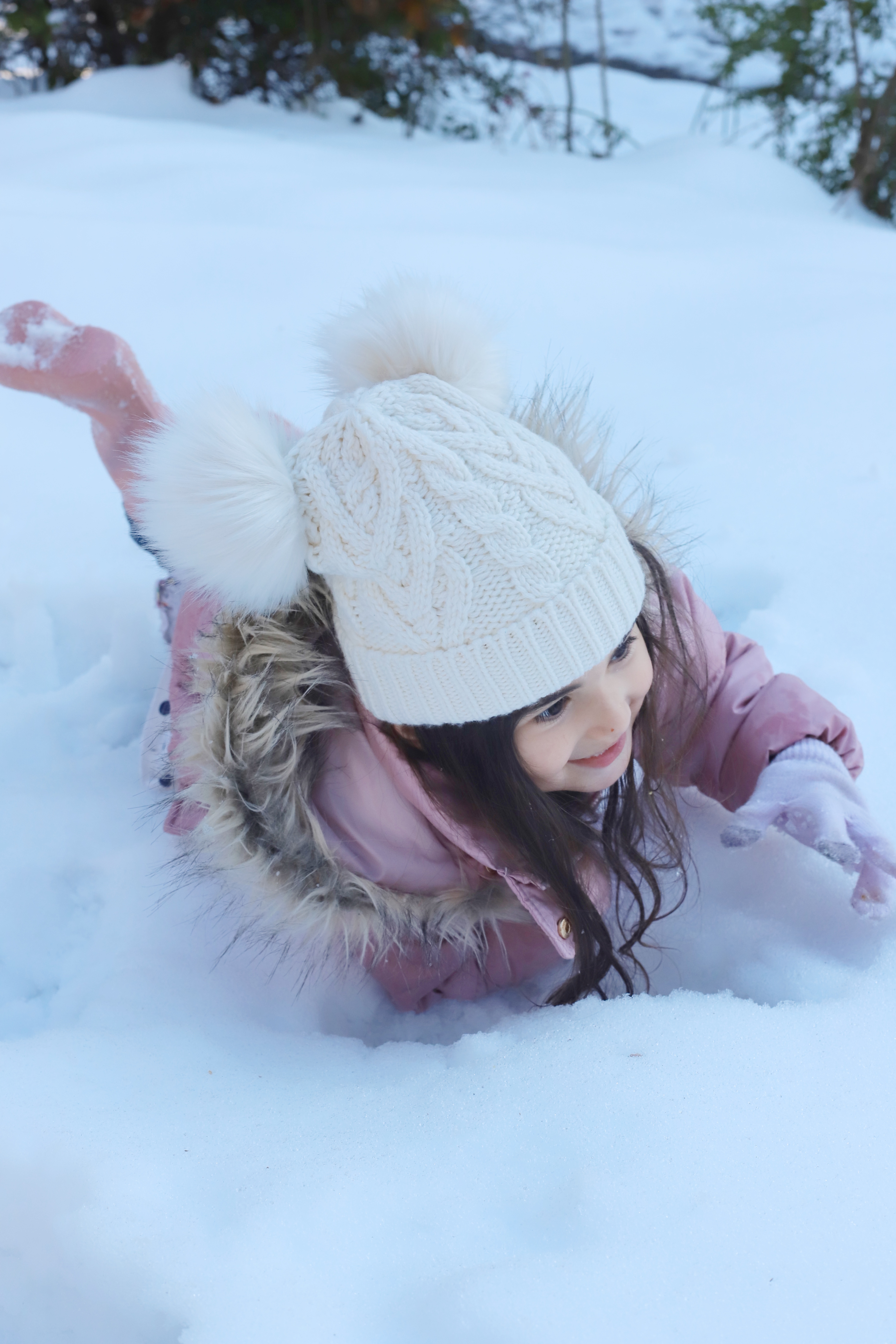 First Snow of the Season + a Fun Way to Paint Snow with Kids. Click through for the DIY. #snowpaint #snowday #snowactivities #snowfun #howtopaintsnow #snowspraypaint | glitterinc.com | @glitterinc