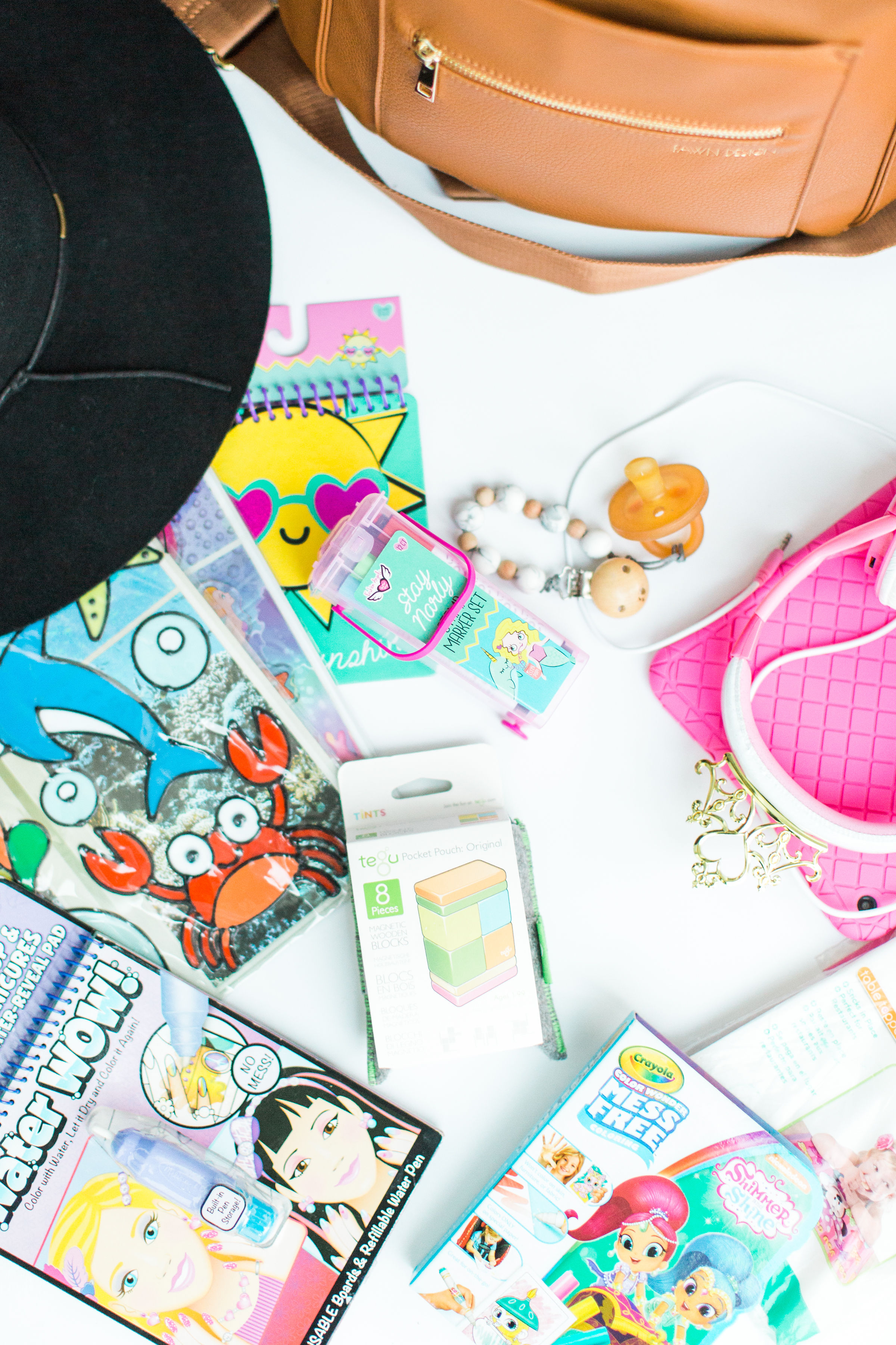 What to Include Inside Airplane Travel Bags for Kids - Spot of Tea