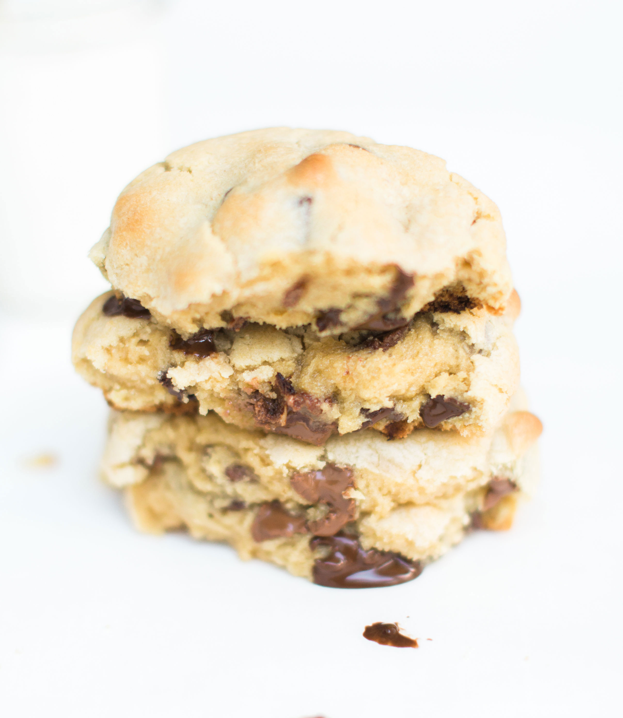 Here it is! The Famous Levain Bakery Chocolate Chip Cookie Recipe that all of New York City is obsessed with; plus a few little tweaks that had our whole family totally crushing on these. You have got to try these super thick, gooey, and decadent #cookies. Click through for the #recipe. #levainbakery #levainbakerychocolatechipcookies #levainbakerycookies #famouscookies | glitterinc.com | @glitterinc