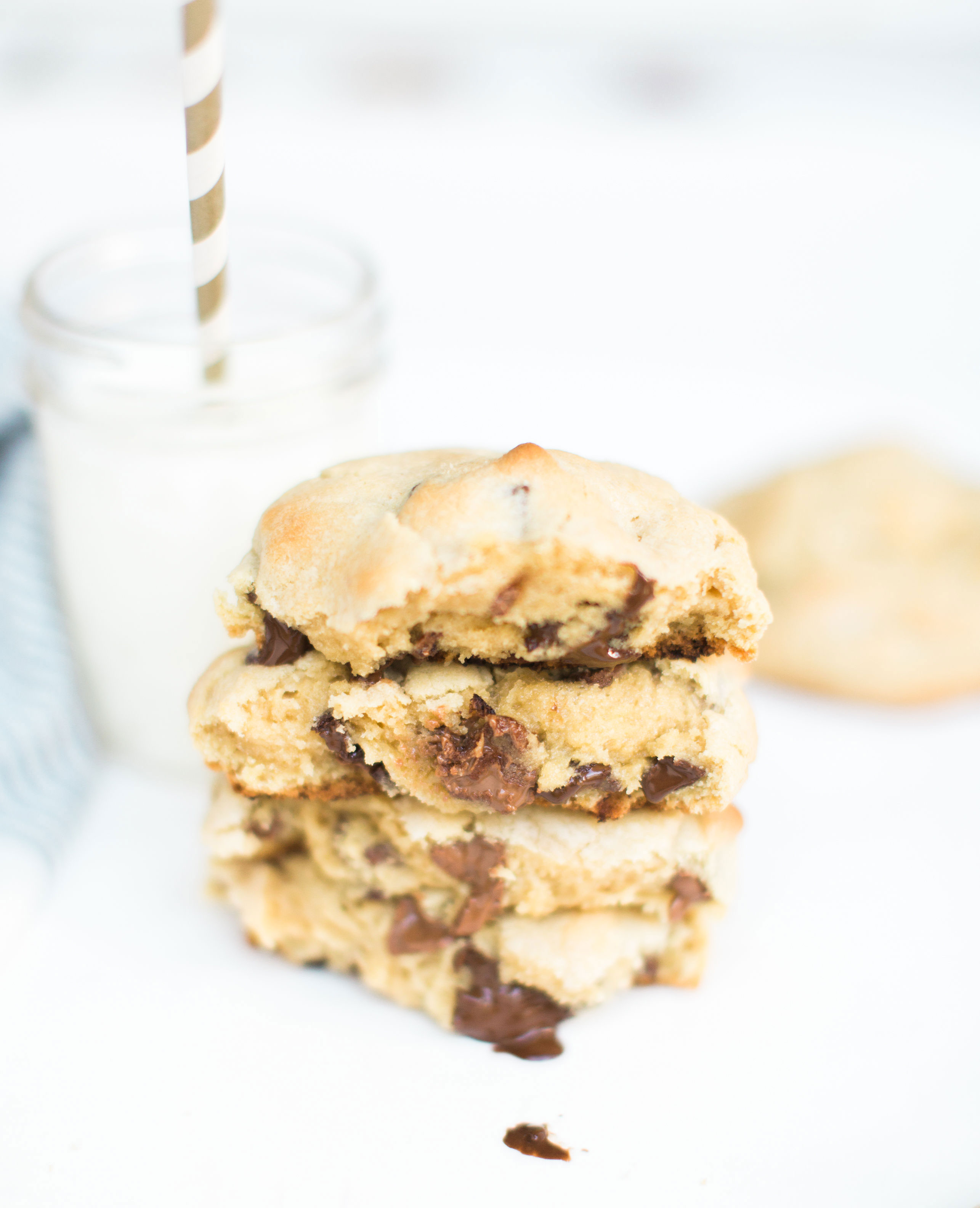 Here it is! The Famous Levain Bakery Chocolate Chip Cookie Recipe that all of New York City is obsessed with; plus a few little tweaks that had our whole family totally crushing on these. You have got to try these super thick, gooey, and decadent #cookies. Click through for the #recipe. #levainbakery #chocolatechipcookies #levainbakerychocolatechipcookies #famouscookies | glitterinc.com | @glitterinc