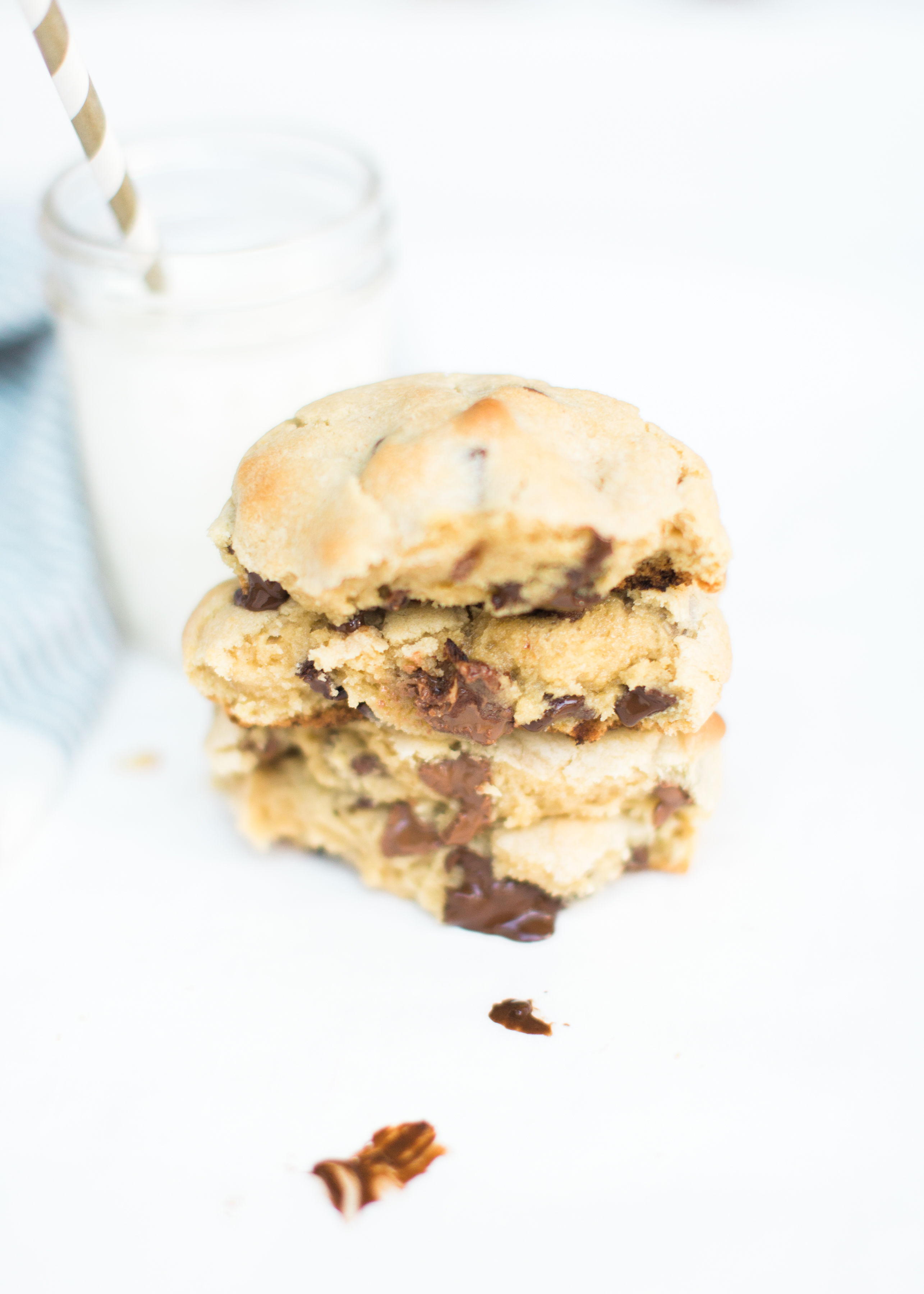 Here it is! The Famous Levain Bakery Chocolate Chip Cookie Recipe that all of New York City is obsessed with; plus a few little tweaks that had our whole family totally crushing on these. You have got to try these super thick, gooey, and decadent #cookies. Click through for the #recipe. #levainbakery #chocolatechipcookies #levainbakerychocolatechipcookies #levainbakerycookies #famouscookies | glitterinc.com | @glitterinc