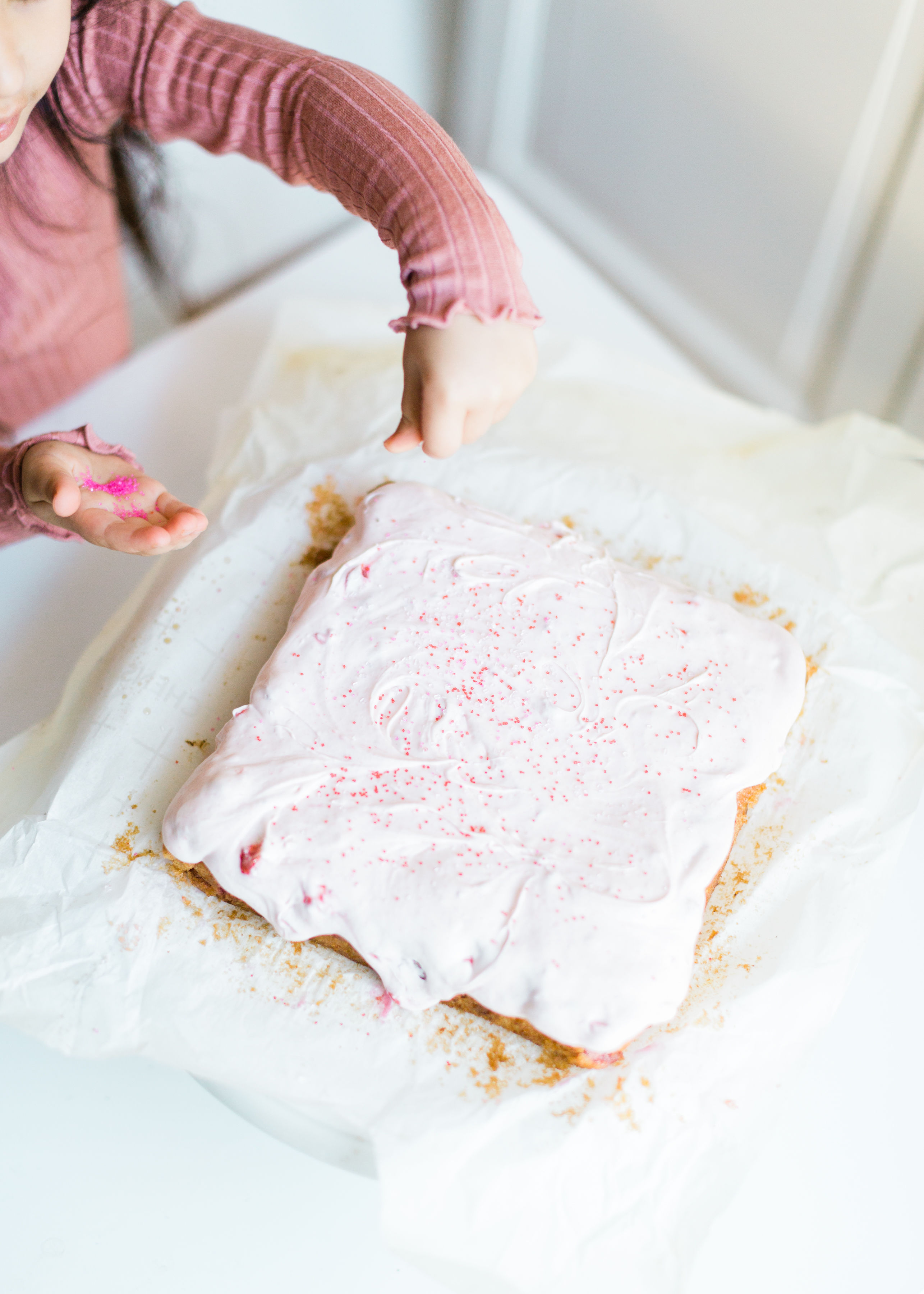 homemade strawberry cake with strawberry frosting