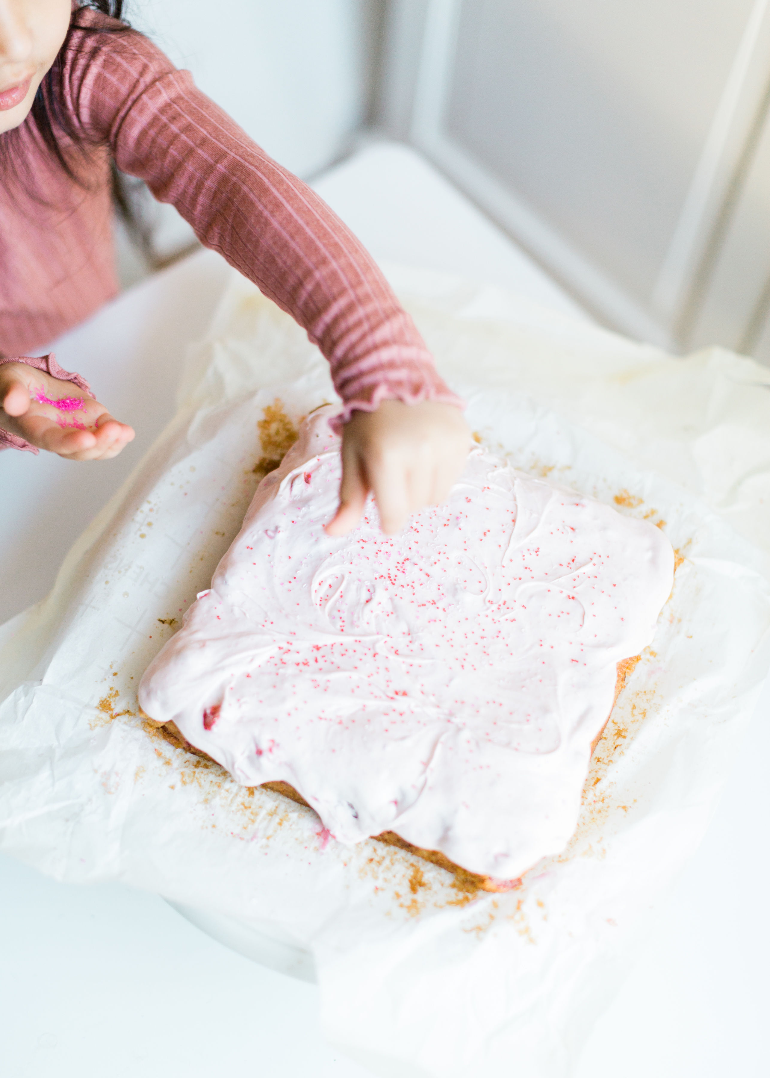 homemade strawberry cake with strawberry frosting