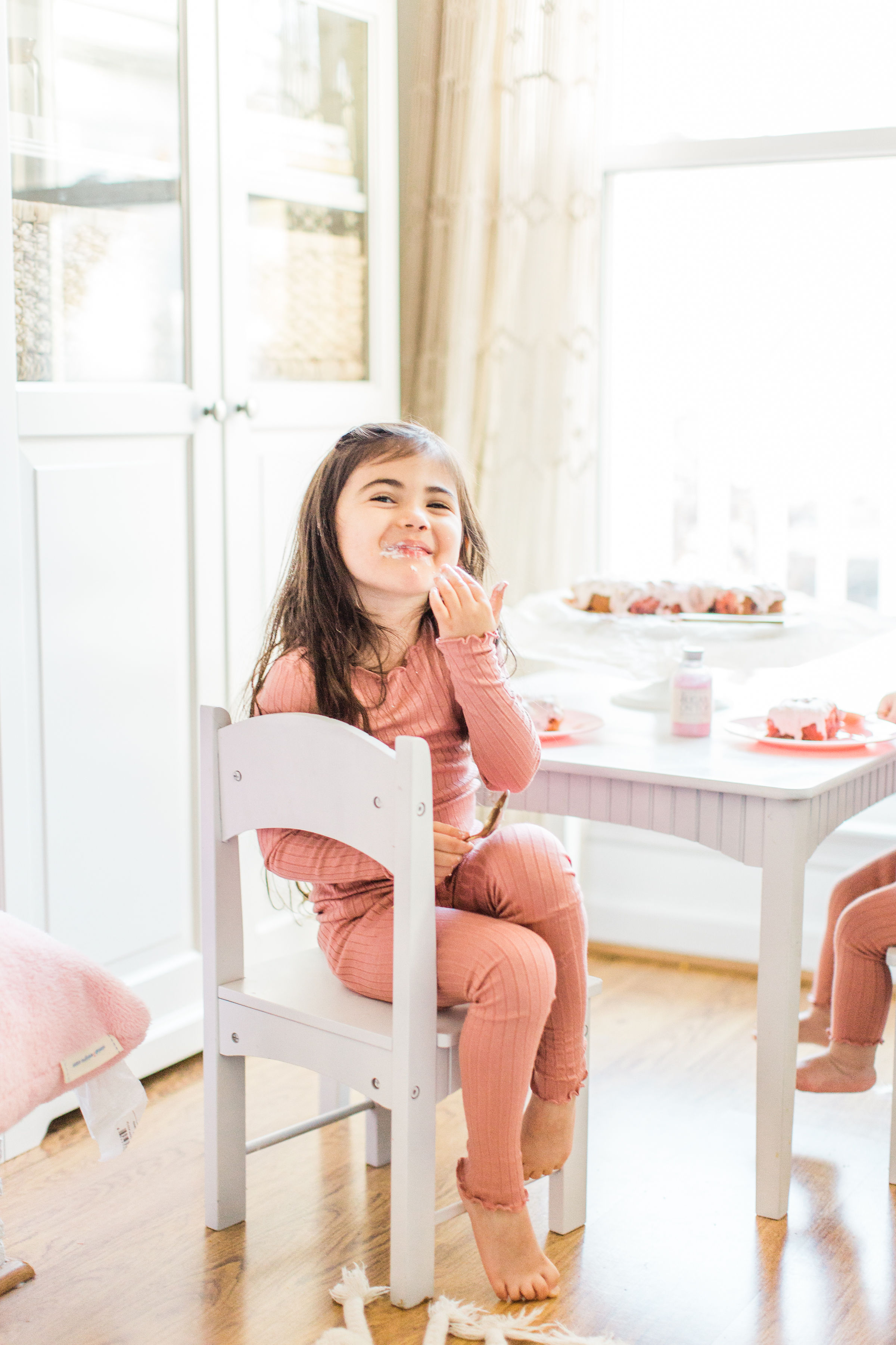 This simple homemade strawberry cake was an instant hit in our house. Easy enough to make with your kids, and bursting with fresh strawberries and topped with a decadent strawberry frosting, you'll be amazed at how moist and delicious this cake is. Click through for the recipe. #strawberrycake #kidsrecipe #easycake #easystrawberrycake #dairyfree #crazycake | glitterinc.com | @glitterinc