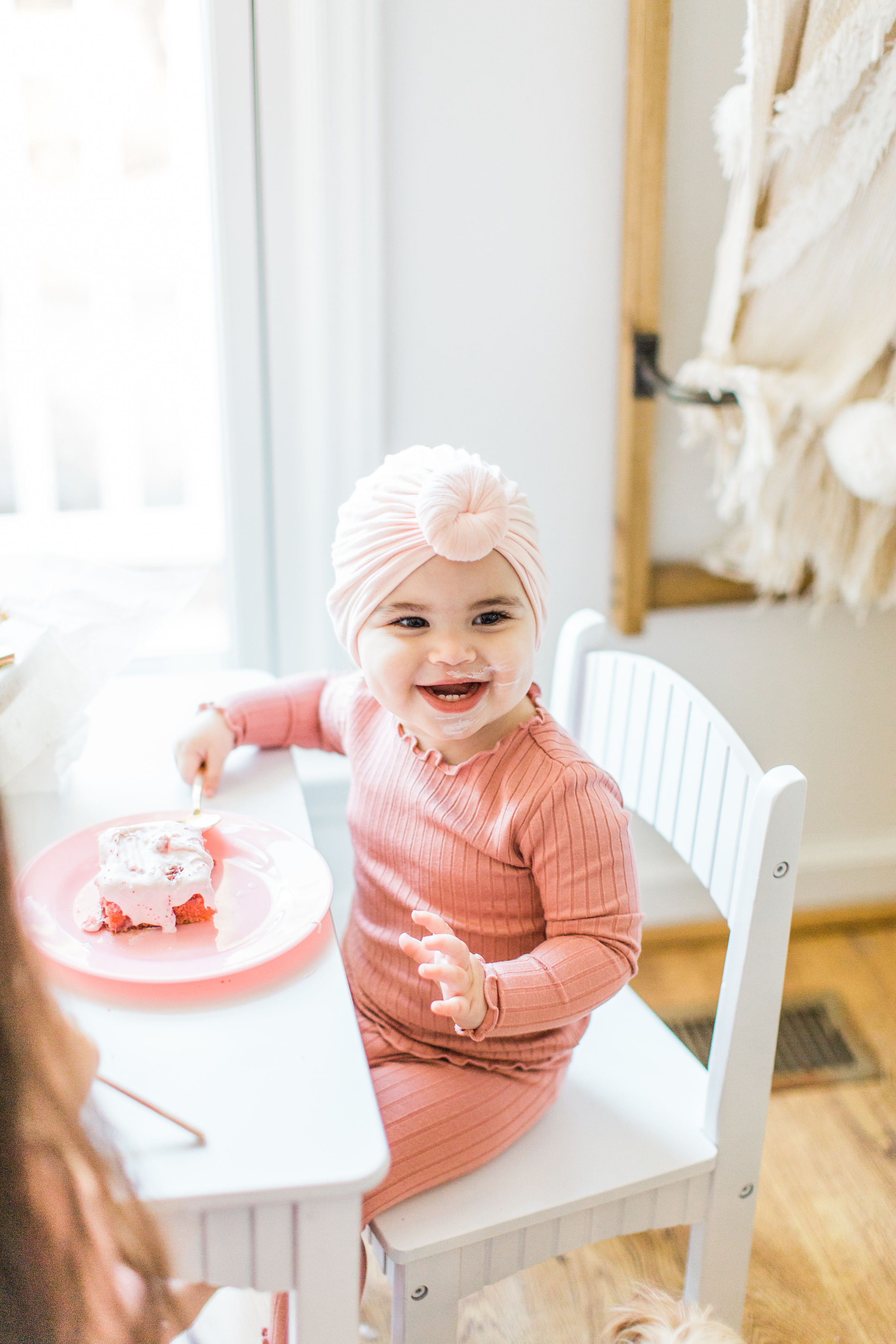 Girl is eating a homemade strawberry cake 