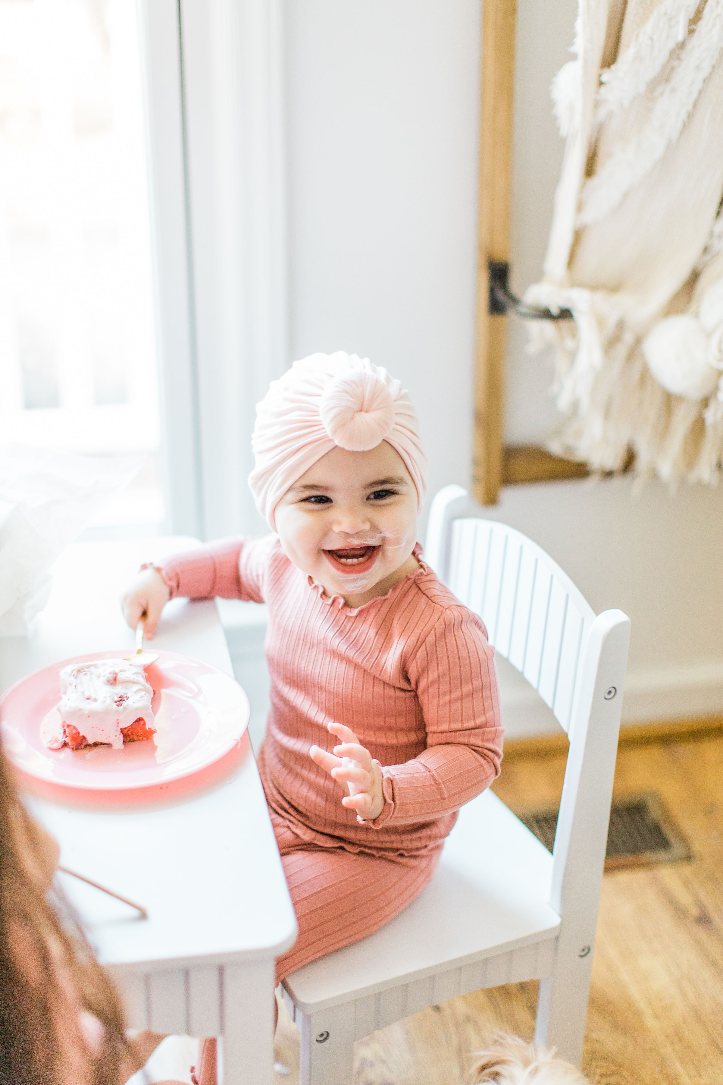 Girl is eating a homemade strawberry cake 