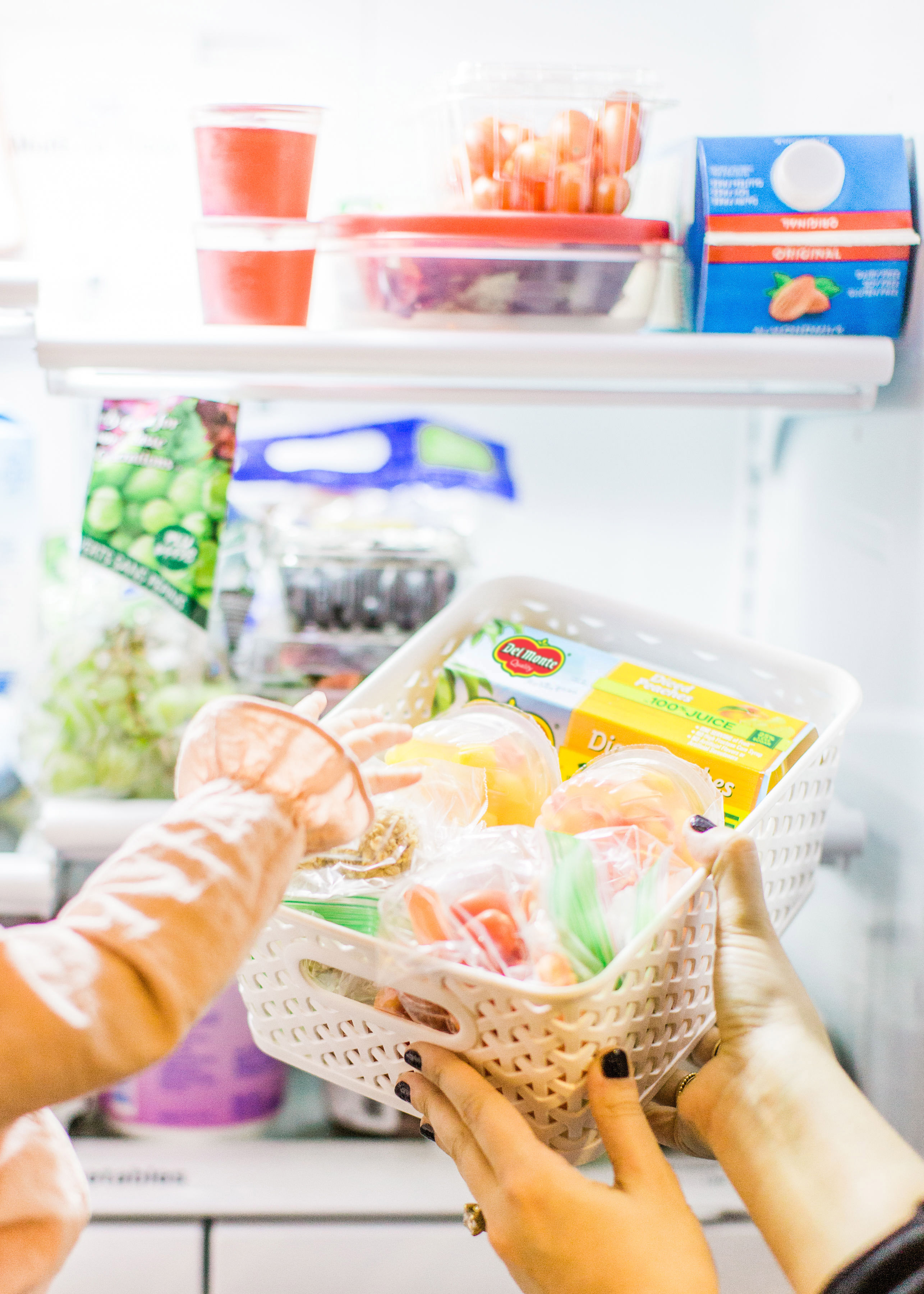 Hoping to simplify snack-time for your family? Create these healthy snack bins, a.k.a., a healthy snack station, stocked with awesome, easy, portable snacks kids and grown-ups alike will love! Perfect for after school snacking. | glitterinc.com | @glitterinc