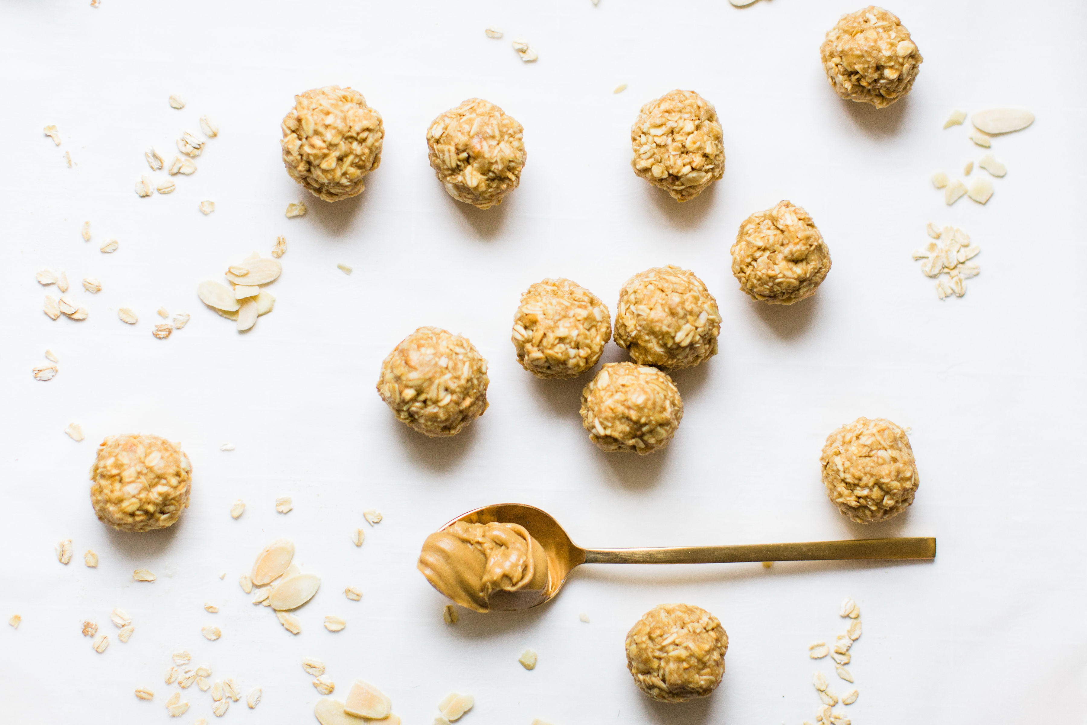 These no-bake energy bites are easy to make, the perfect combination of sweet and salty, have plenty of added protein thanks to the peanut butter, and kids absolutely love them because they're basically delicious no-bake cookies! Click through for the recipe. #snack #energybites #nobake #nobakecookies #healthysnack #kidsrecipe #kidssnack | glitterinc.com | @glitterinc