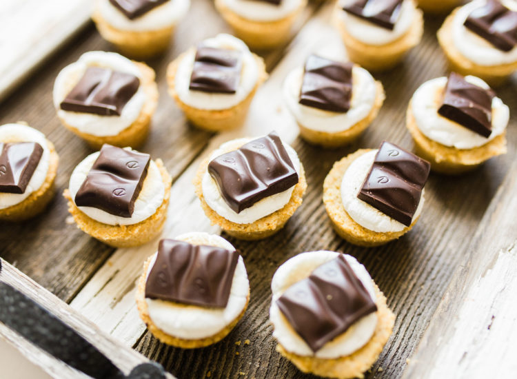 Move over campfire s'mores, these s'more cookie cups, made with perfectly sweet and chewy graham cracker cookie cups topped with toasted marshmallows and rich chunks of chocolate, are giving the classic dessert a run for its money. Click through for the recipe. | glitterinc.com | @glitterinc
