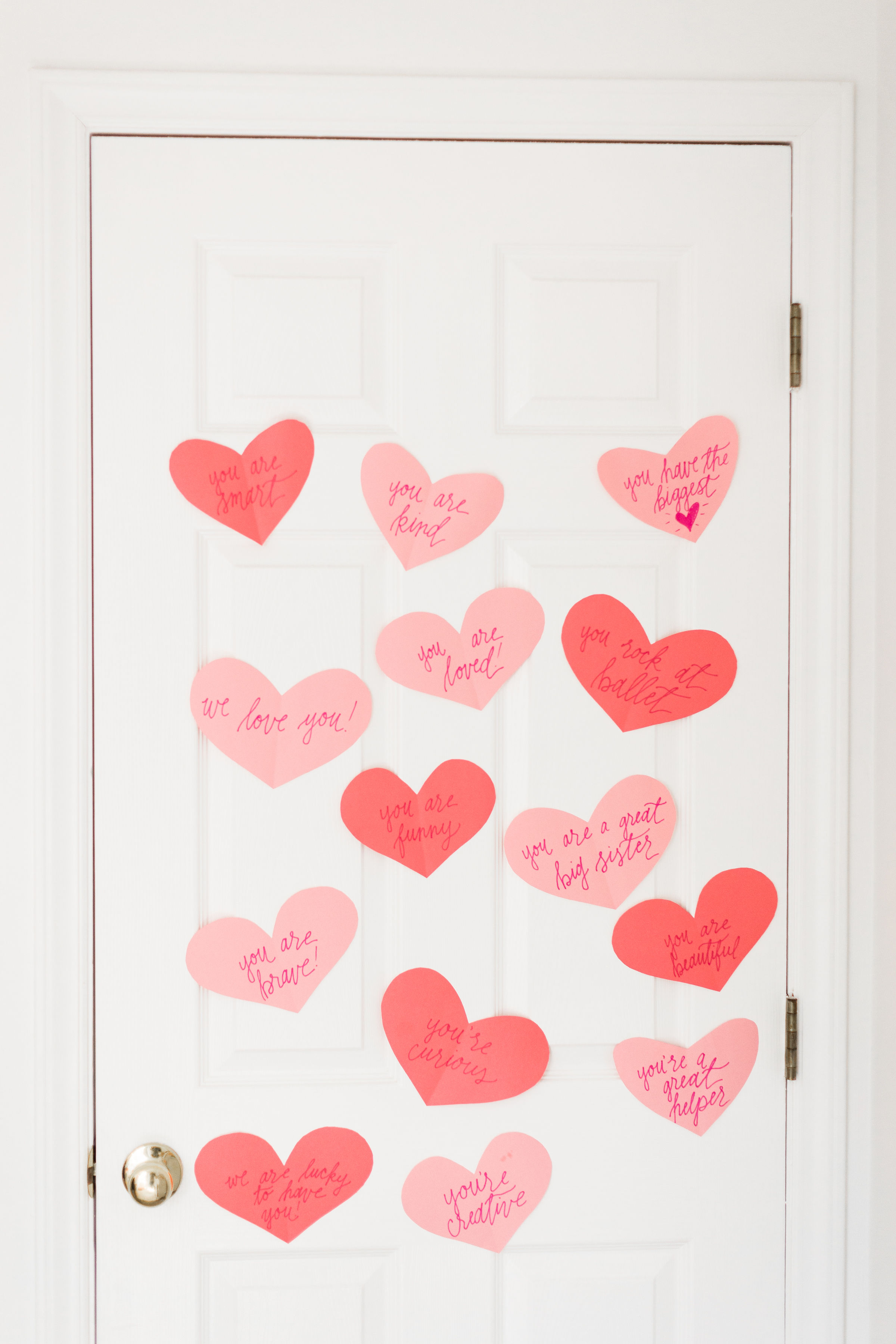 A DIY heart attack - paper hearts spelling out the reasons you love your Valentine - are sure to surprise and delight kids and grown-ups alike! | glitterinc.com | @glitterinc