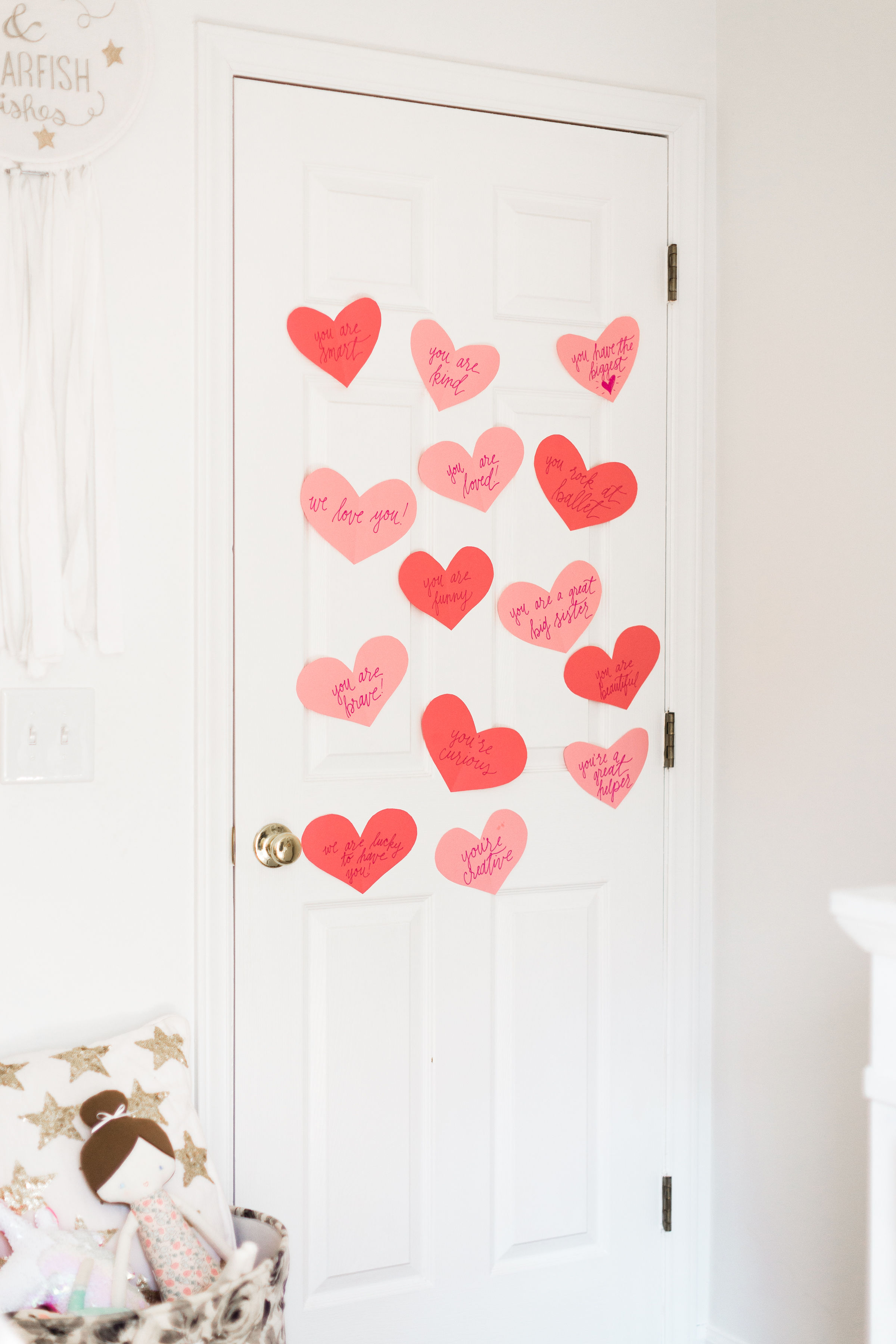 A DIY heart attack - paper hearts spelling out the reasons you love your Valentine - are sure to surprise and delight kids and grown-ups alike! | Click through for the details. | glitterinc.com | @glitterinc