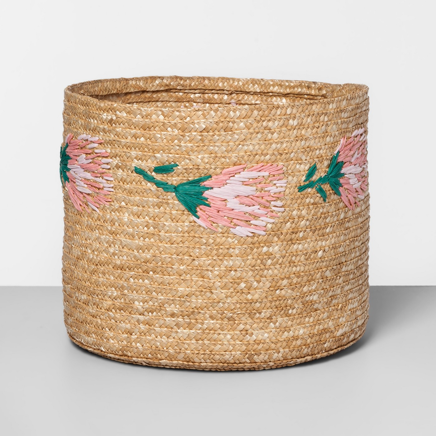 https://glitterinc.com/wp-content/uploads/2019/04/Opalhouse-Embroidered-Straw-Protea-Basket.jpg