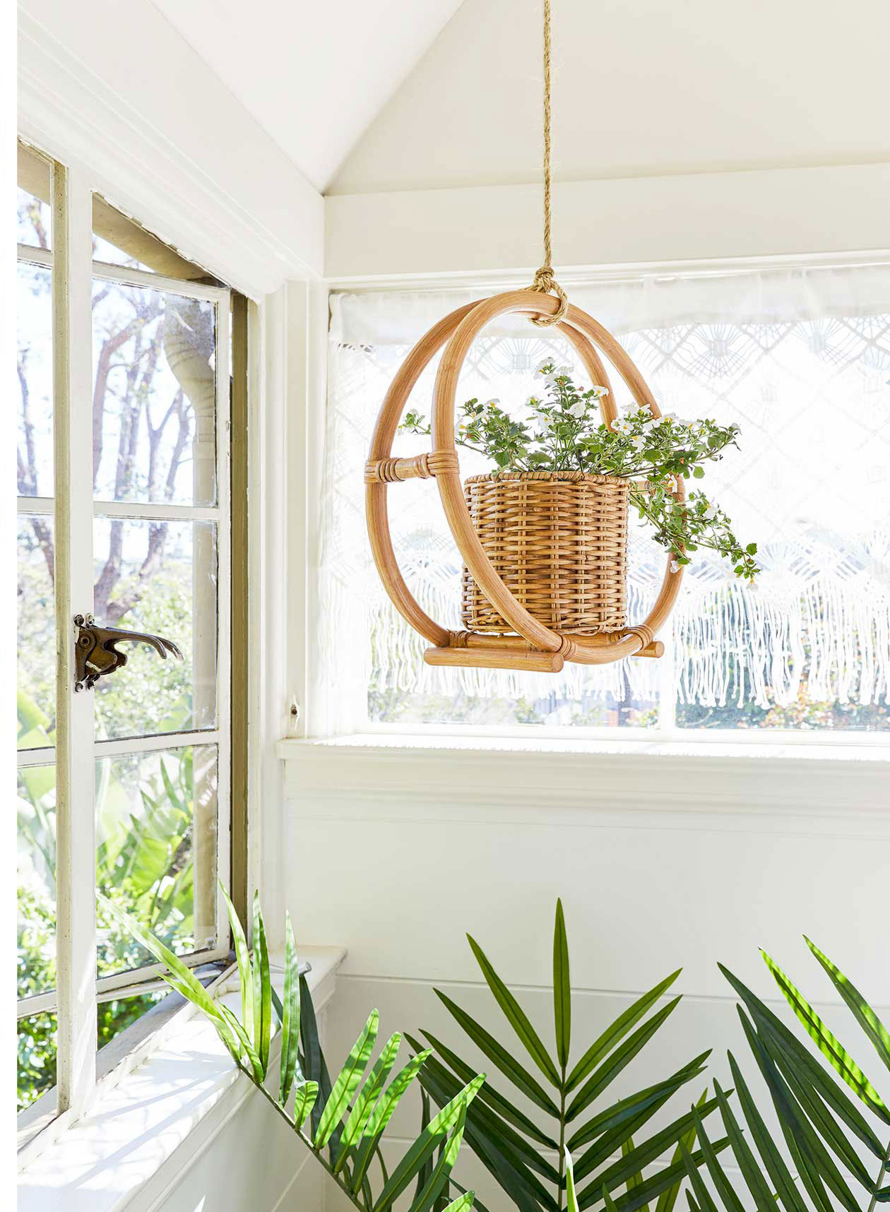 https://glitterinc.com/wp-content/uploads/2019/04/Opalhouse-Rattan-Round-Hanging-Planter.jpg