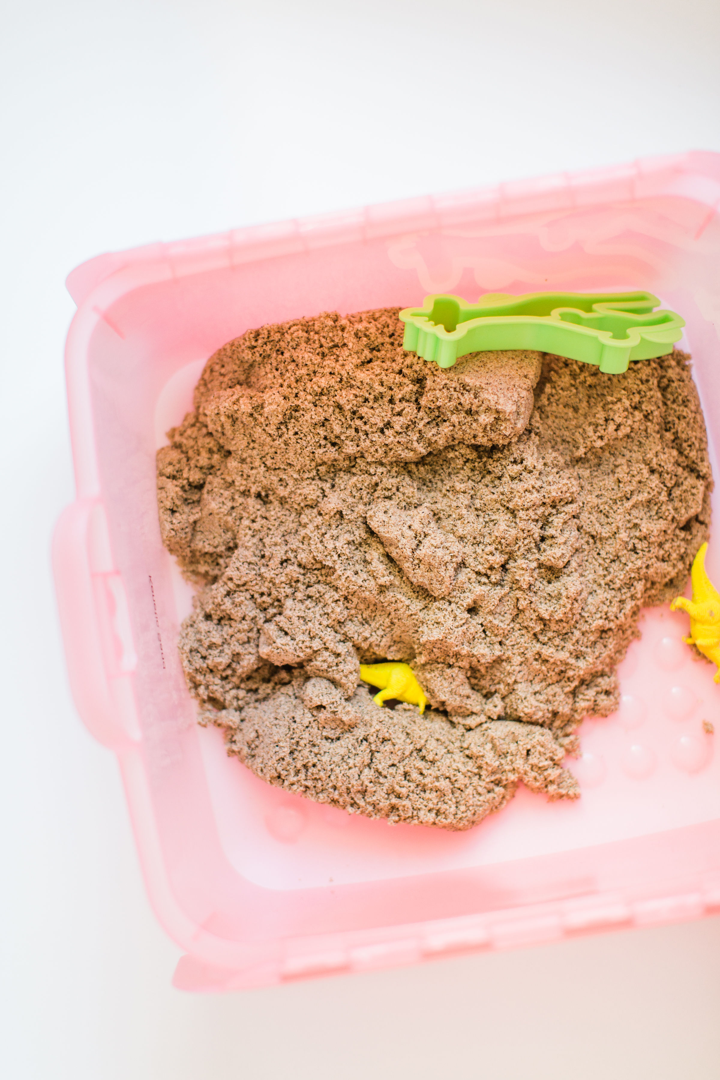 The kinetic sand also doesn't dry out in these bins, which is awesome.