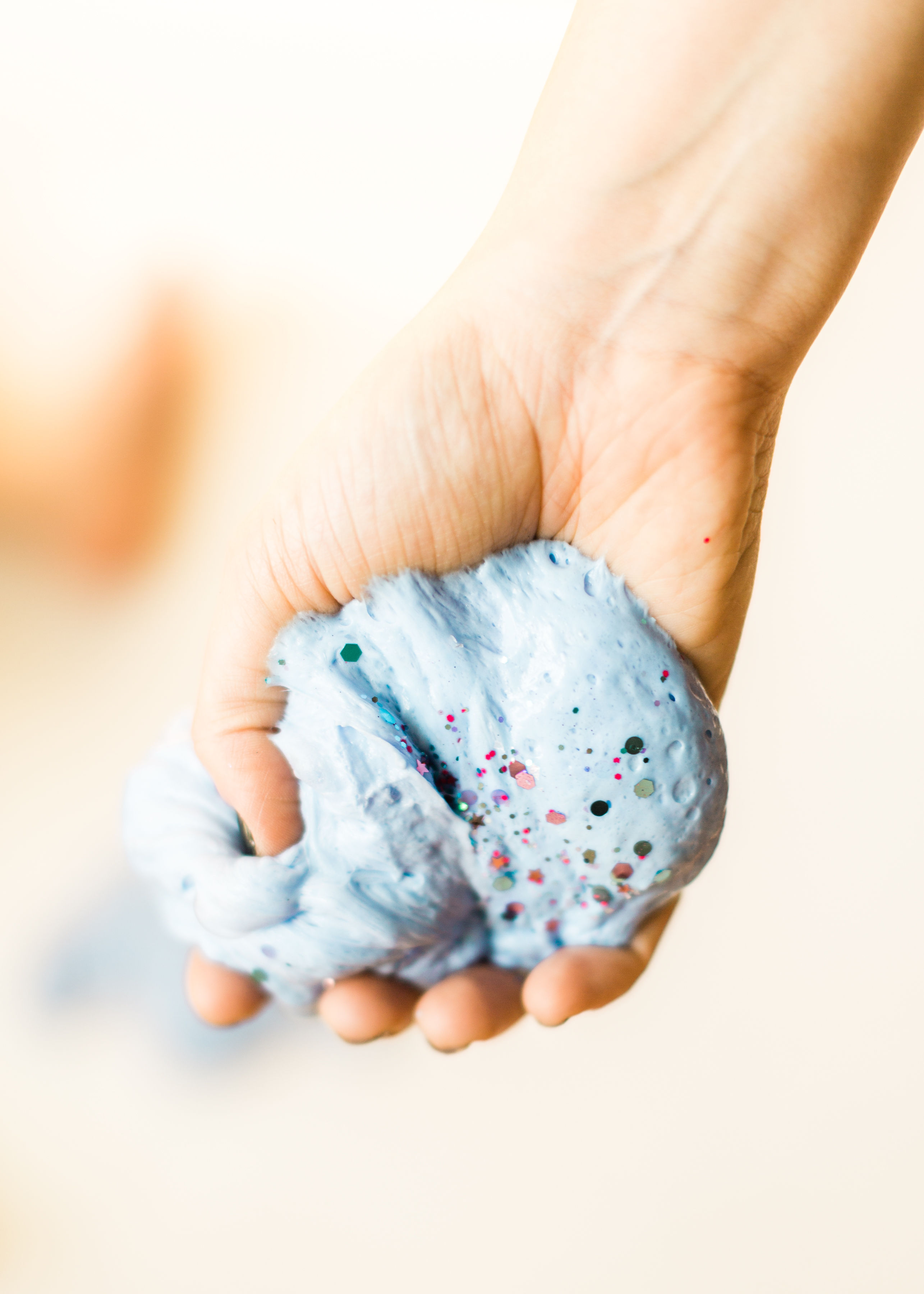 This awesome fluffy slime is a super simple upgrade to classic slime. Plus, kids are obsessed with the fun texture! It’s truly a perfect kids activity. Slick through for the recipe. | glitterinc.com | @glitterinc