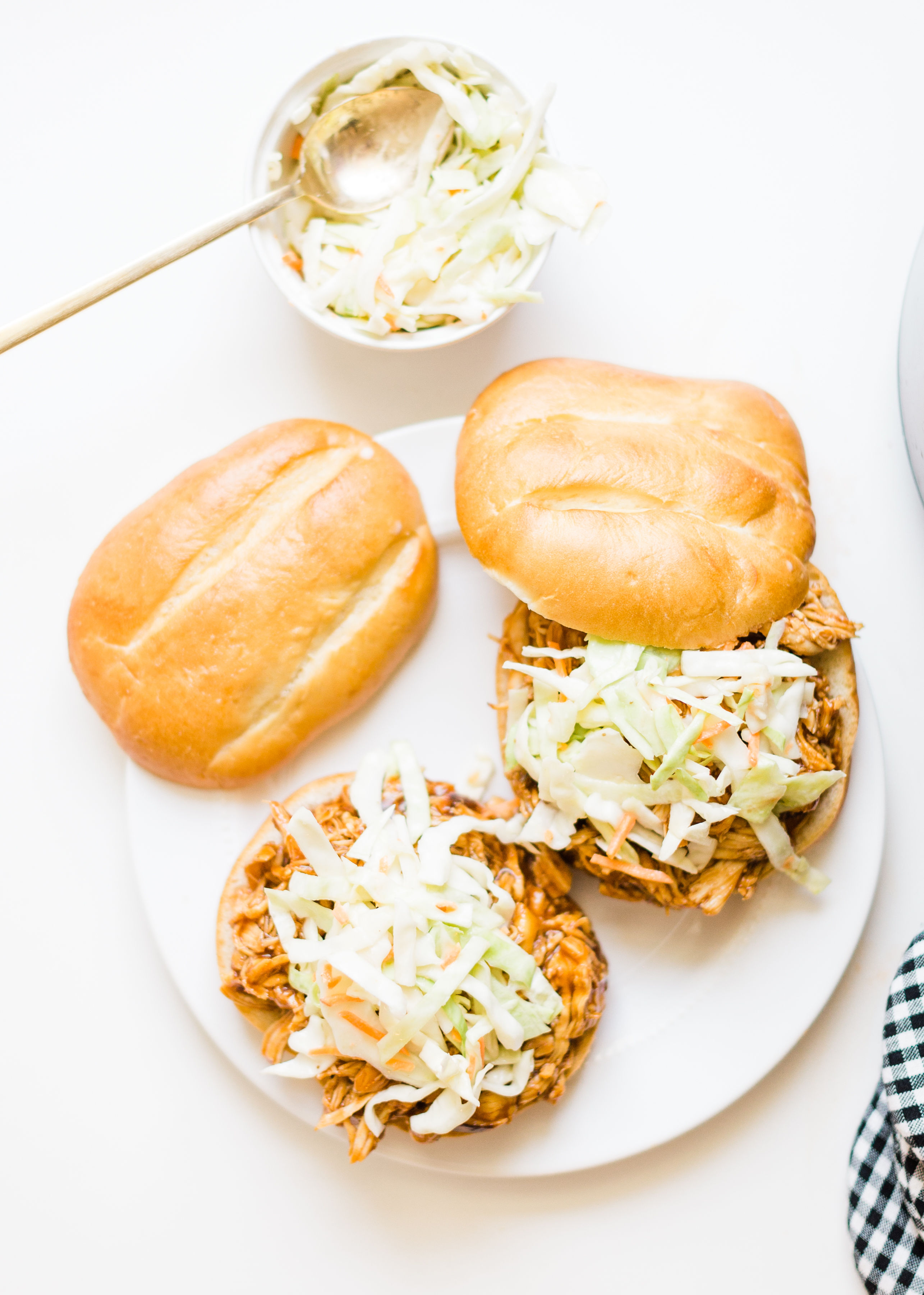 Crockpot BBQ Pulled Chicken. Yum! Click through for the BBQ recipe. | glitterinc.com | @glitterinc