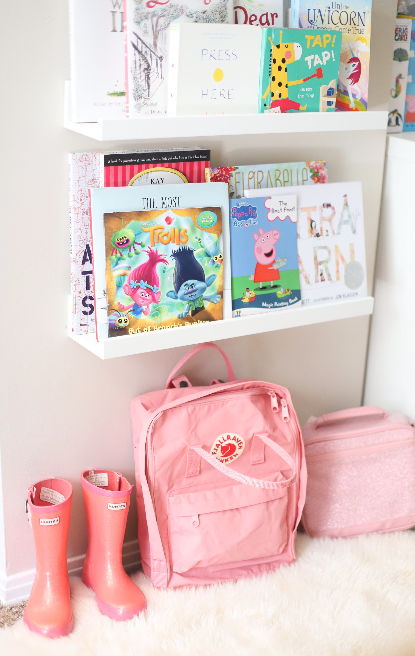 It's Back to School season!! Celebrate their first day of school by creating an extra special family tradition that they’ll cherish from preschool, kindergarten, all the way up through high school. // book wall | glitterinc.com | @glitterinc