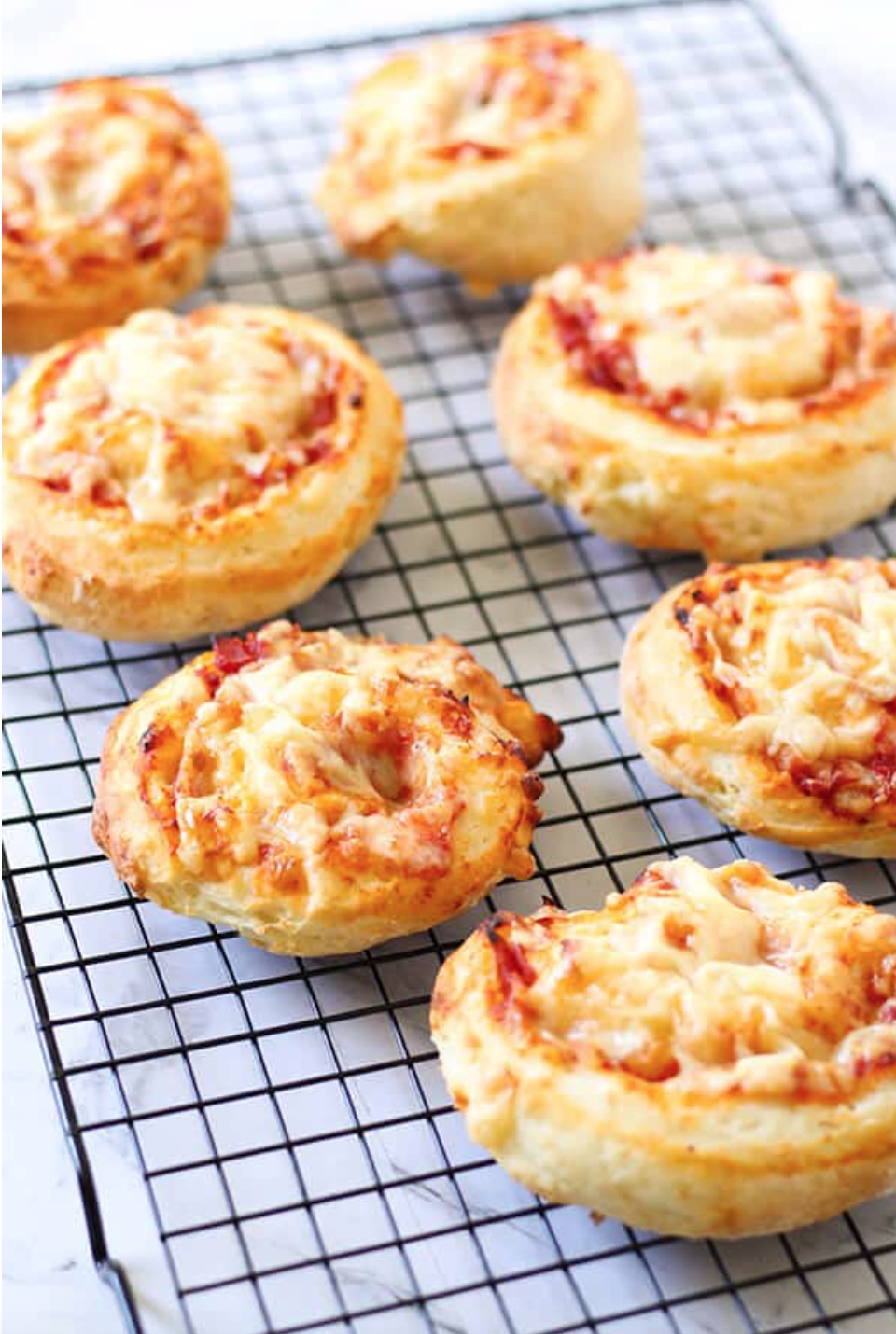 Ham and cheese scrolls are the perfect bite sized snack for kids