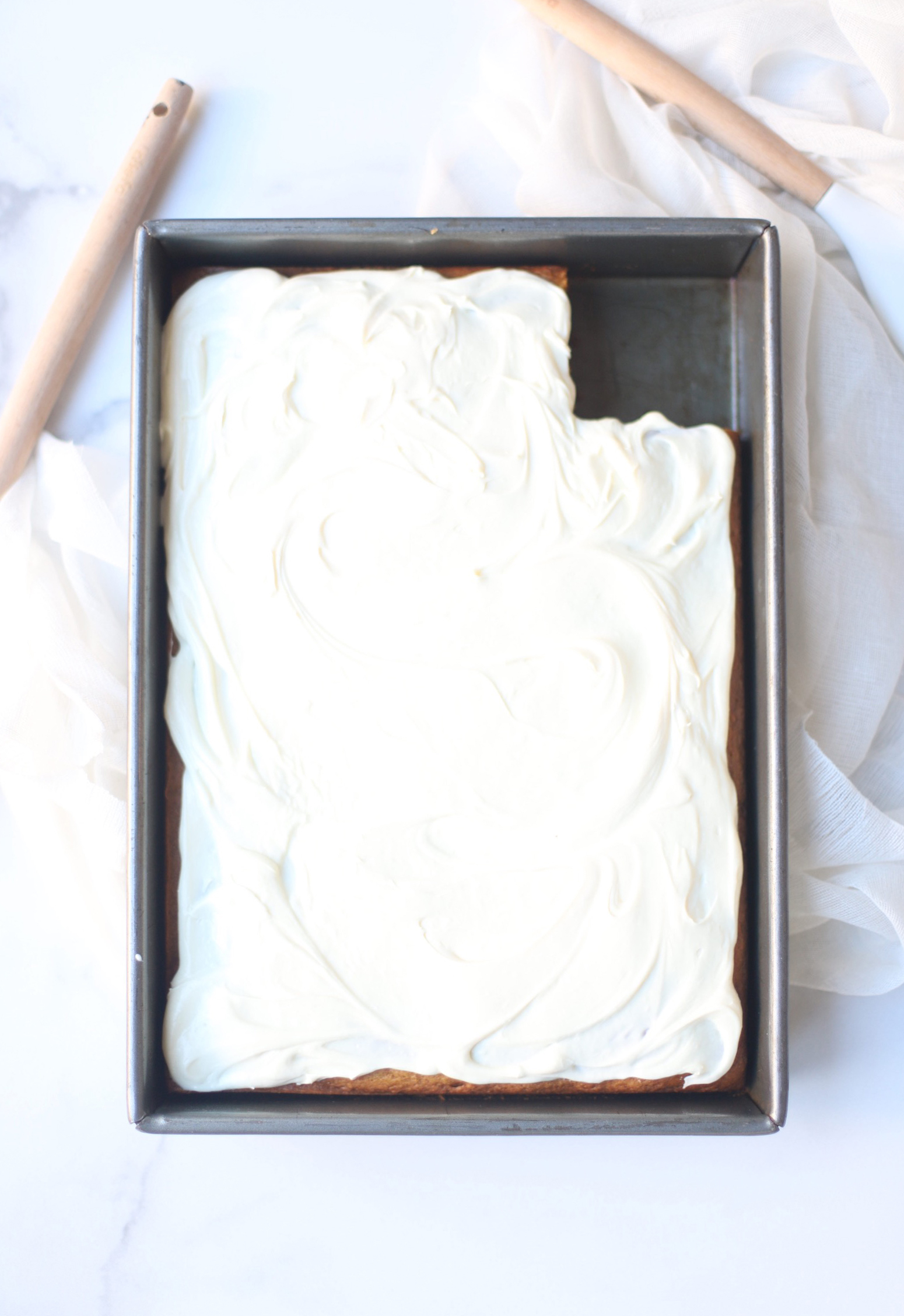 A total crowdpleaser, this gluten-free pumpkin sheet cake with cream cheese frosting is so simple to make and unbelievably yummy. And can easily be made dairy free. The end result tastes like everything good about fall! Click through for the recipe. | glitterinc.com | @glitterinc