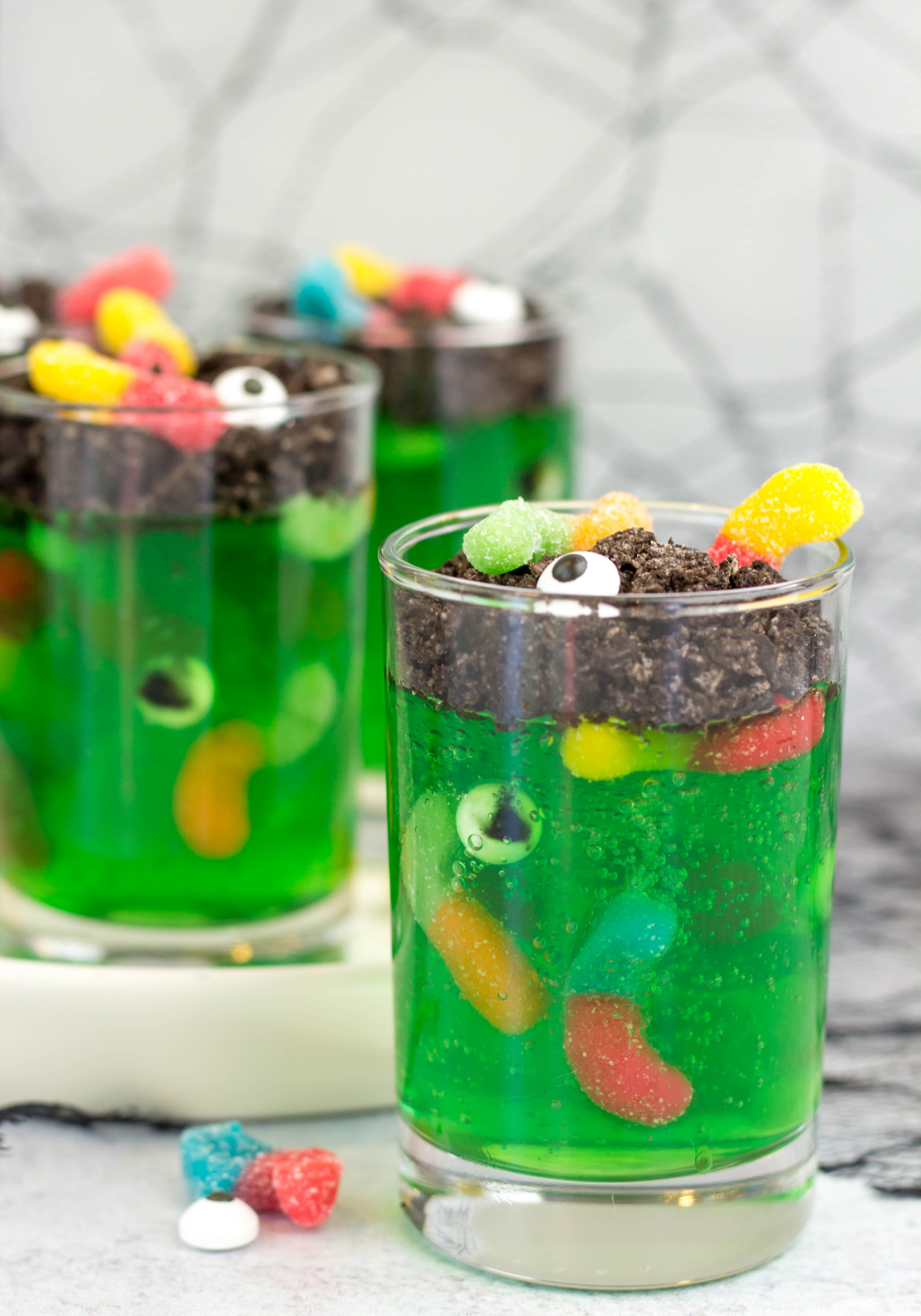 From savory appetizers to spooky sweet desserts to brilliant punch ideas, this spooktacular list, chock full of 50+ fun Halloween recipes, has everything you'll need for one epic Halloween celebration! Click through for the recipes. | glitterinc.com | @glitterinc