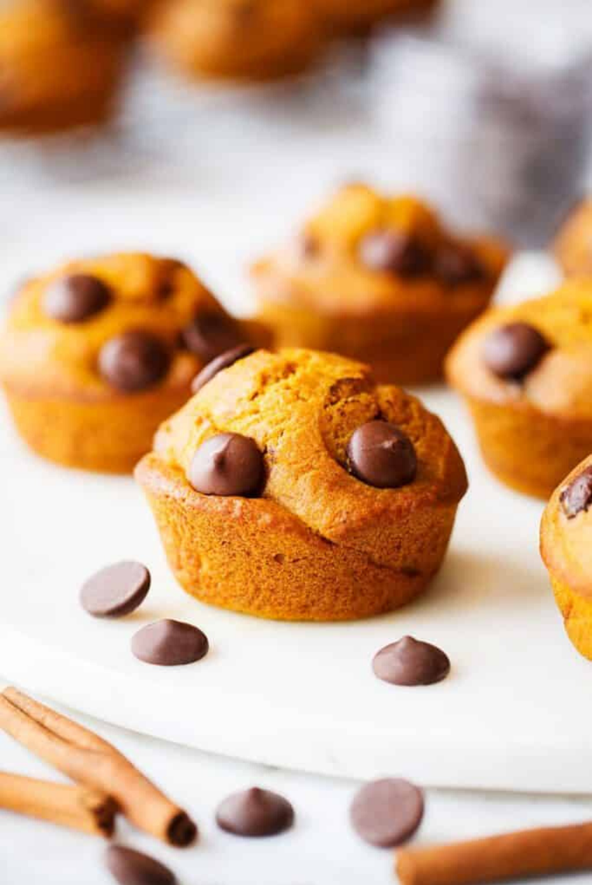 These delicious snacks, packed with the season's best fall flavors, will keep you and your family happily snacking all fall long! Click through for the recipes. | glitterinc.com | @glitterinc // Pumpkin Chocolate Chip Muffins