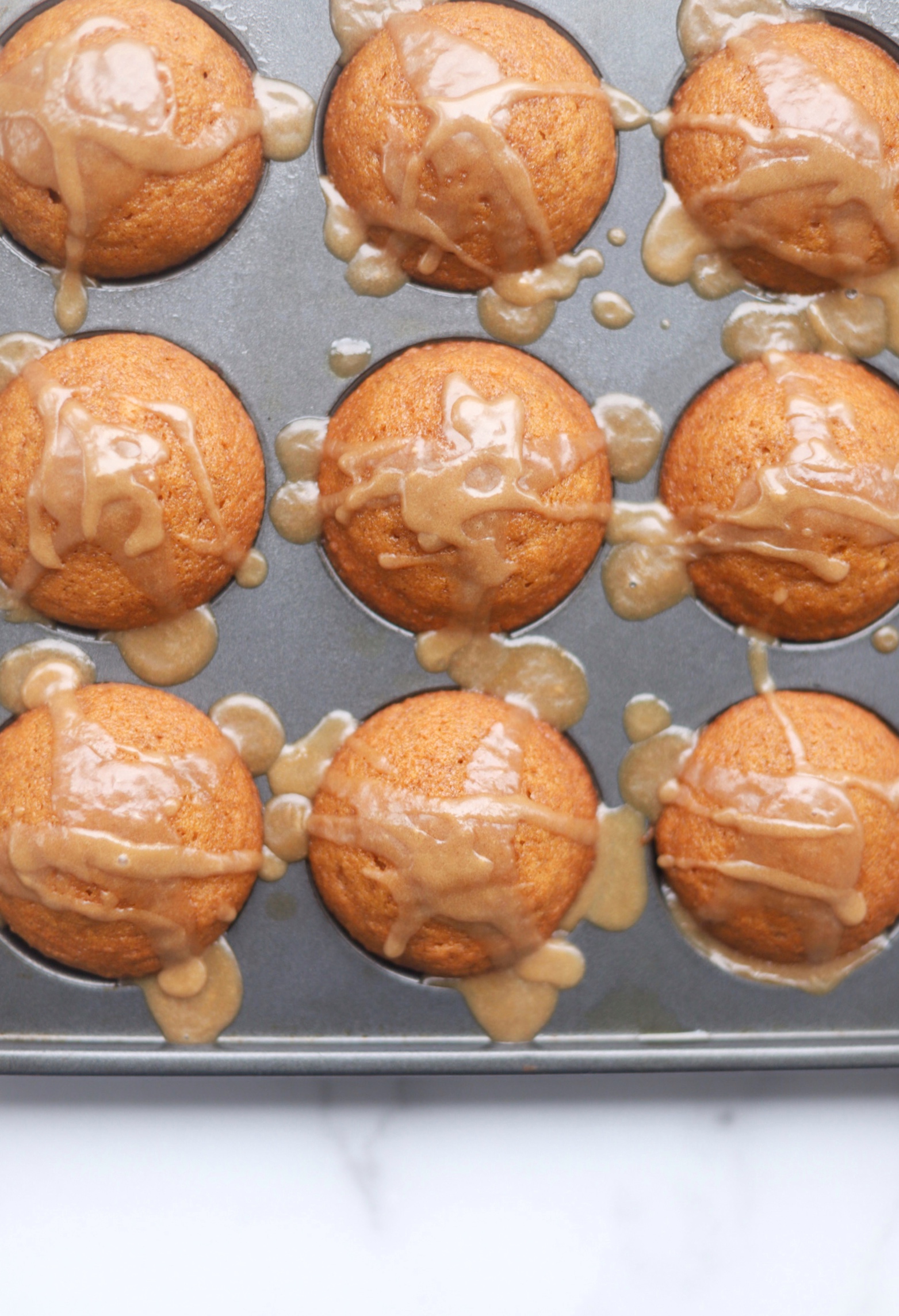 Pumpkin Muffins Topped with Brown Sugar Cinnamon Glaze - GLITTERINC.COM