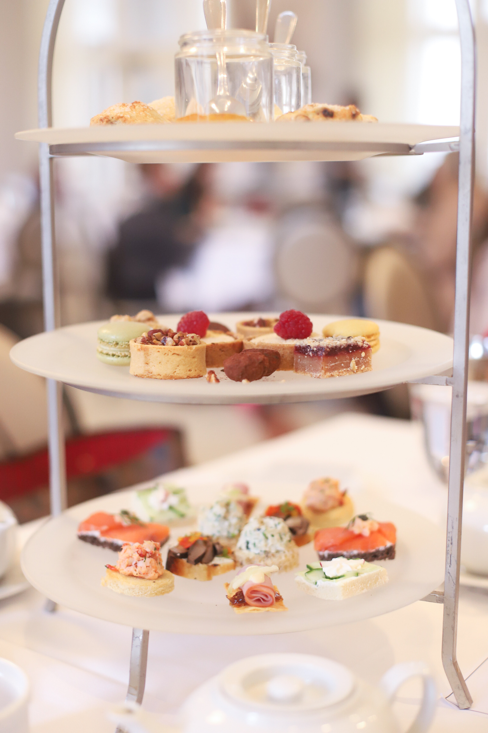 Visiting Boston? Be sure to spend an afternoon at The Courtyard Tea Room in the Boston Public Library for the yummiest, classic high tea in the city! Bonus: it's a kid-friendly afternoon tea, perfect for families. | glitterinc.com | @glitterinc