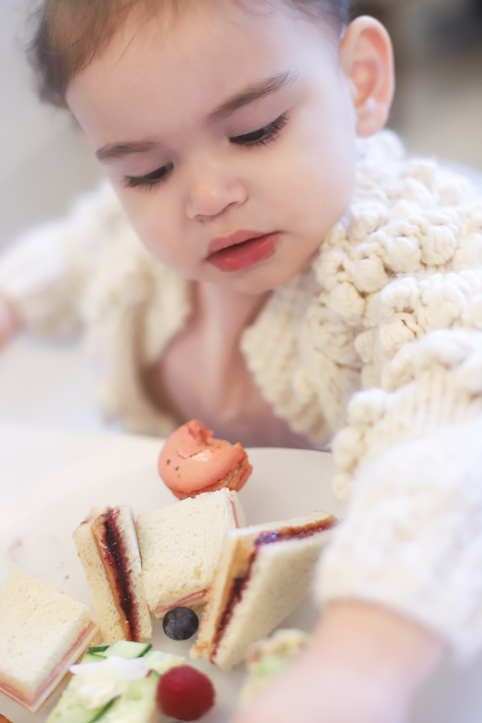 Visiting Boston? Be sure to spend an afternoon at The Courtyard Tea Room in the Boston Public Library for the yummiest, classic high tea in the city! Bonus: it's a kid-friendly afternoon tea, perfect for families. | glitterinc.com | @glitterinc