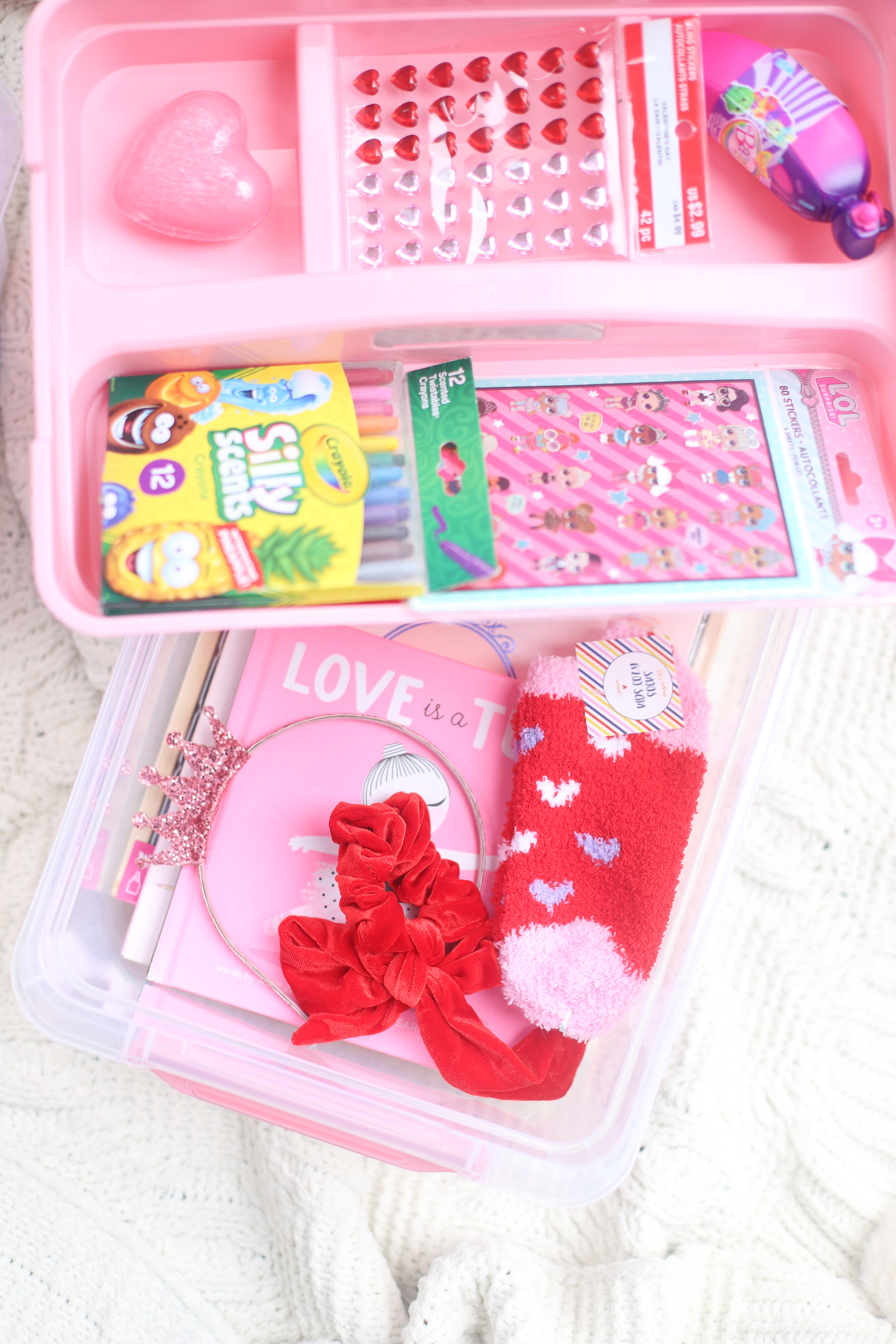 Put together the cutest DIY Valentine's Day Kids Gift Basket in a super functional storage box that your kids can use again and again for holding their crafts, school supplies, and more! Using the most amazing Latchmate Storage Boxes. | glitterinc.com | @glitterinc