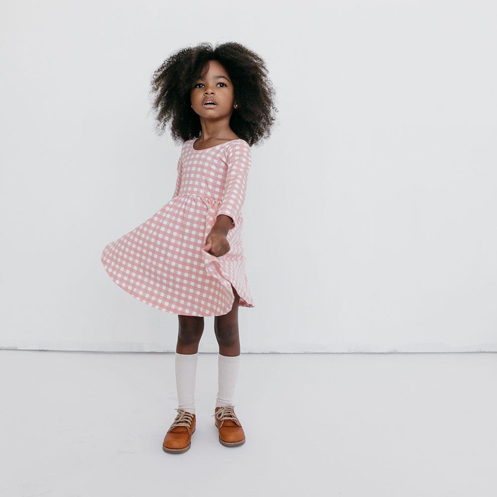 If you have a little girl who loves a great twirly dress, this post is for you! Sharing where to find the very best twirly dresses; a.k.a., skater dresses, for kids. | glitterinc.com | @glitterinc // Alice + Ames Twirly Dress for Girls