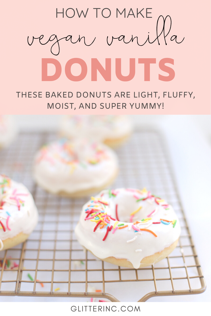 Totally fluffy, soft, moist, and amazingly dairy-free, you would never know that these crowd-pleasing donuts are vegan, and baked, to keep this delicious dessert a little healthier. These baked vegan vanilla donuts are the perfect treat for birthday parties, holidays, gifting, bake sales, and more! Click through for the recipe. | glitterinc.com | @glitterinc
