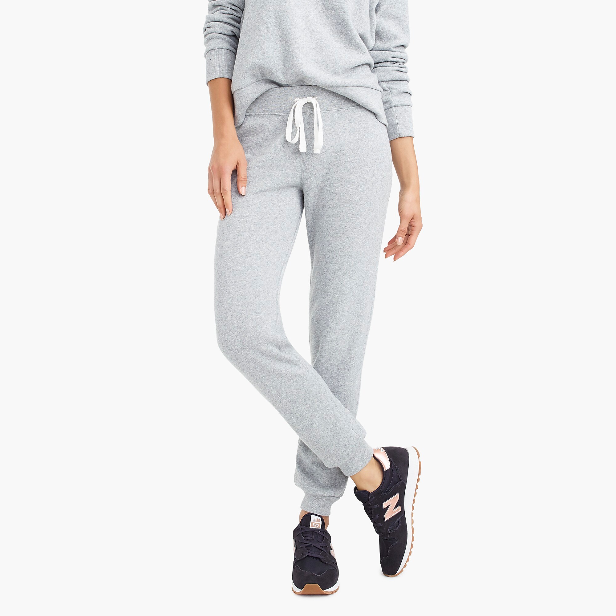 Slip into one of these adorably chic and on trend Loungewear Sets and Matching Sweatsuits, look cute as could be from the comfort of your sofa, and and stay on budget. These adorable and under $50 cozy and chic sets will get you through the season in total comfort! | glitterinc.com | @glitterinc // J.Crew Supersoft Fleece Sweatpant + J.Crew Pocket Sweatshirt